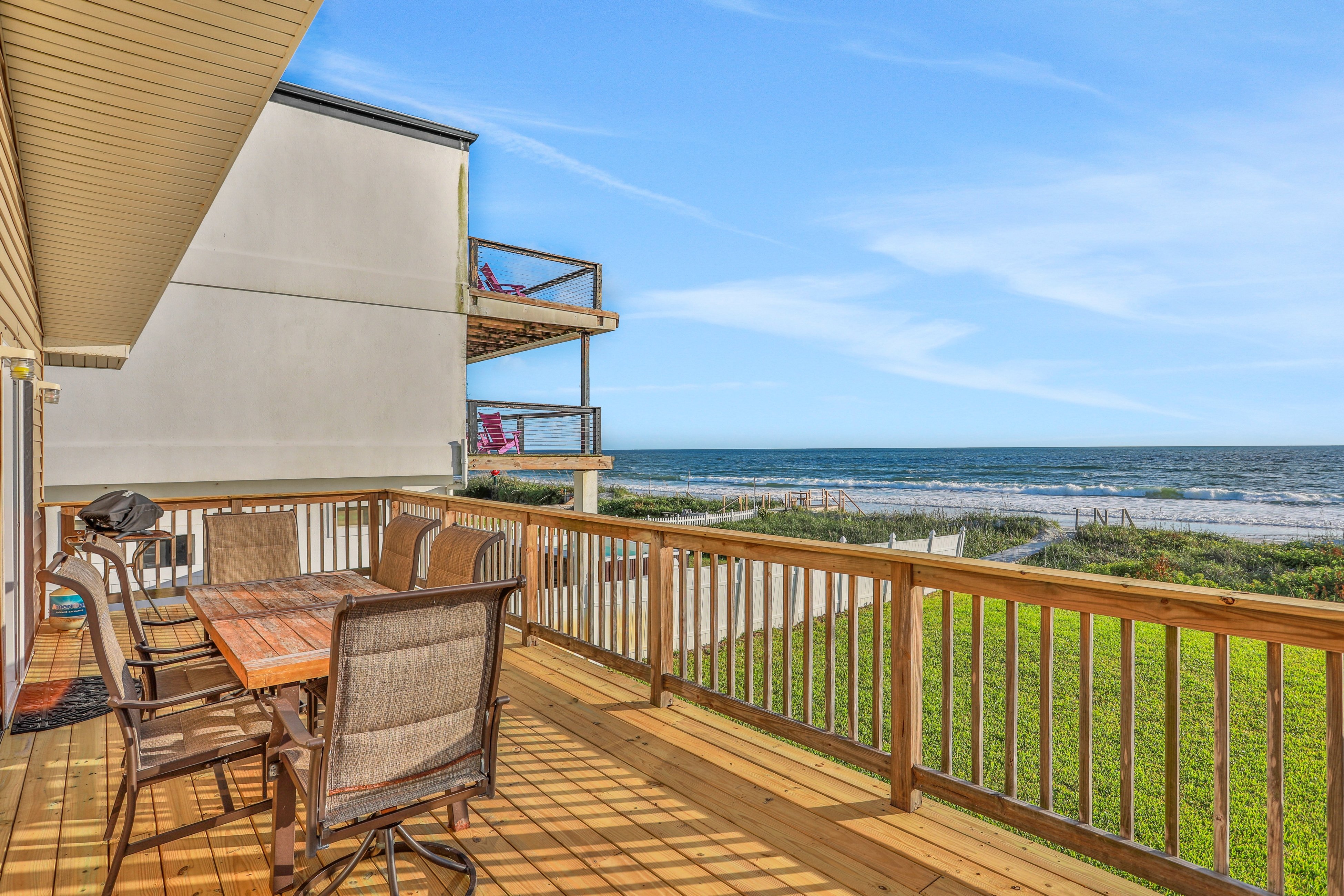 Oceanfront home w/ two kitchens, furnished patio & balcony, & beach access