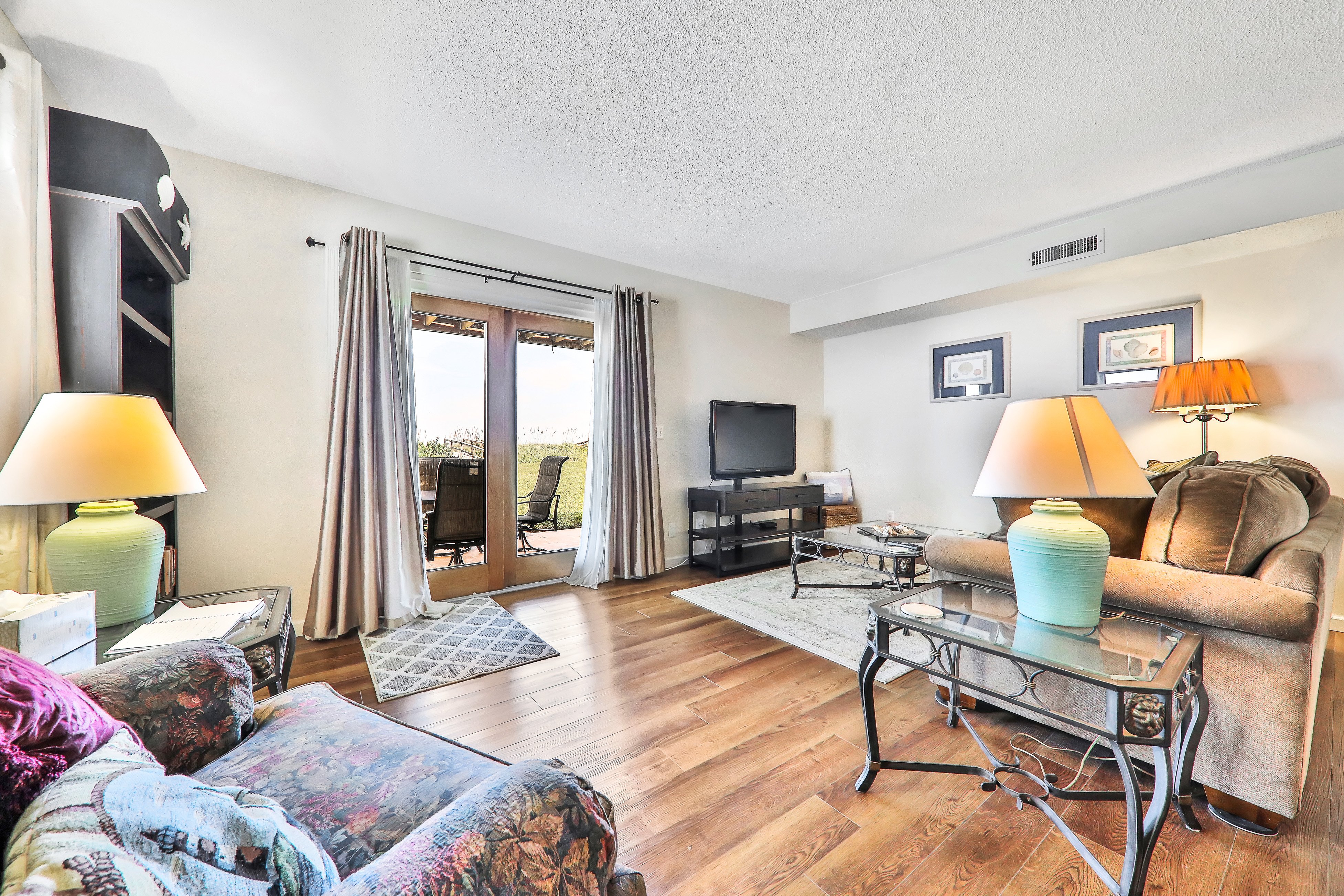 Oceanfront home w/ two kitchens, furnished patio & balcony, & beach access