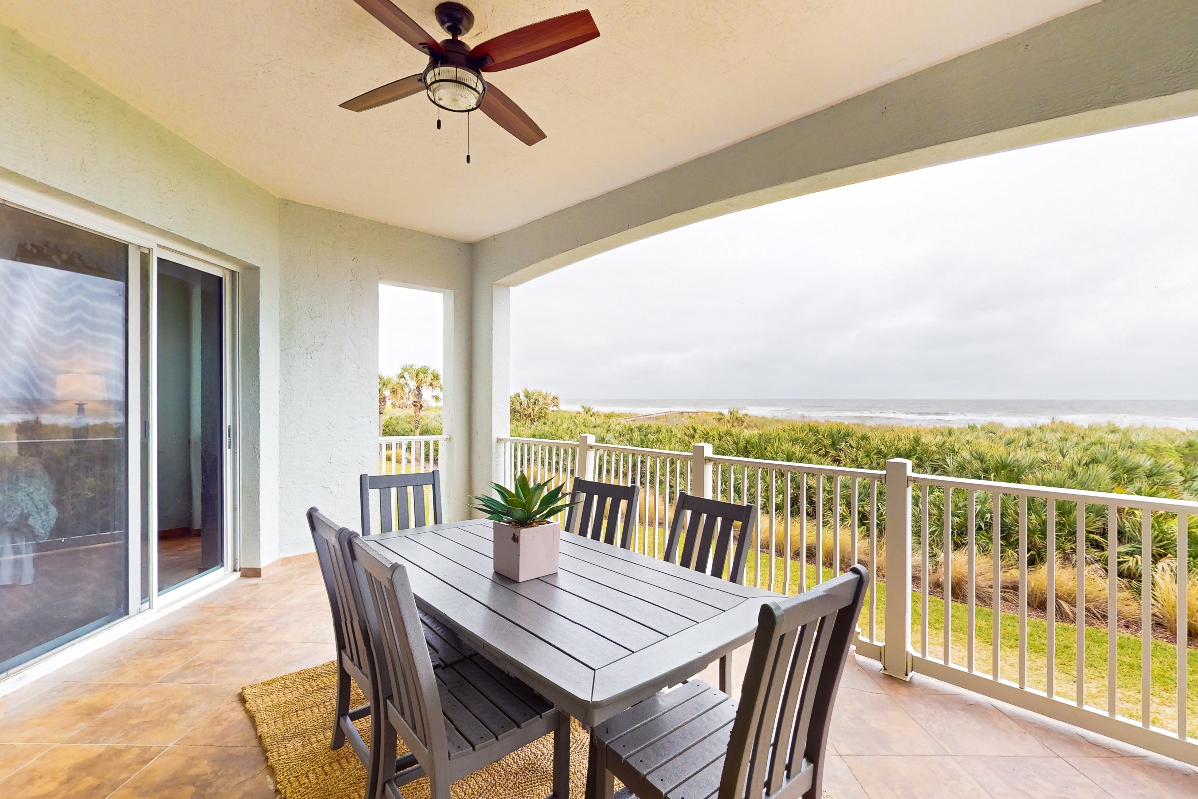Oceanview condo with resort amenities, balcony and private beach access