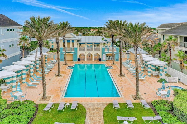 Oceanview condo with resort amenities, balcony and private beach access