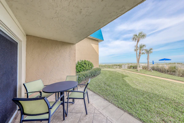 Island-themed living with furnished patio, shared pool & beach access