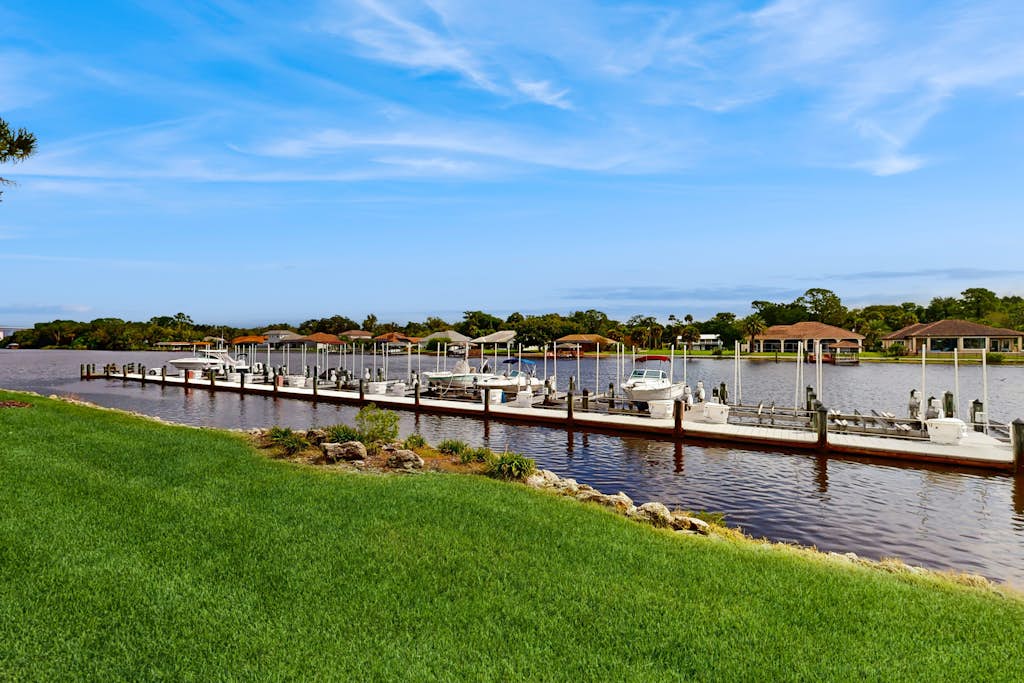 Ground floor waterview condo with resort amenities, private patio and pool