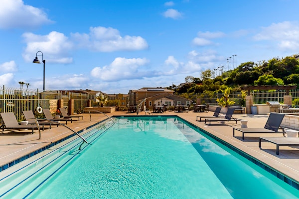 Plumeria Retreat - Modern, 3-story townhome with pool & patio - 30-Night Minimum