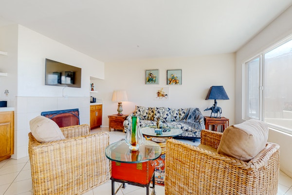 Beachfront Condo at the Sea Ground-floor condo with ocean views, fireplace, on-site hot tubs & sauna