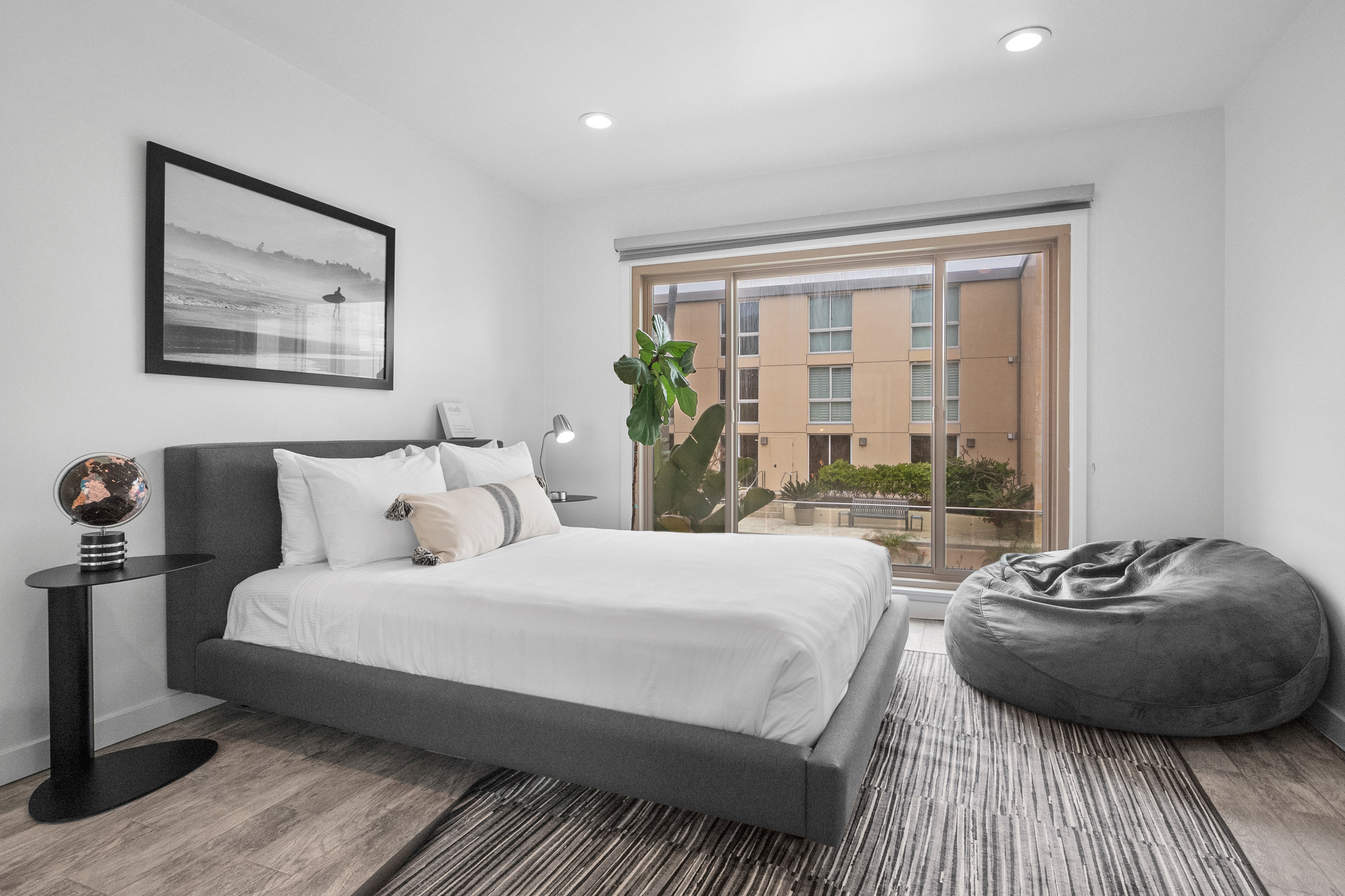 Beachfront Oasis Modern condo right on the beach with ocean views - 30-Night Minimum