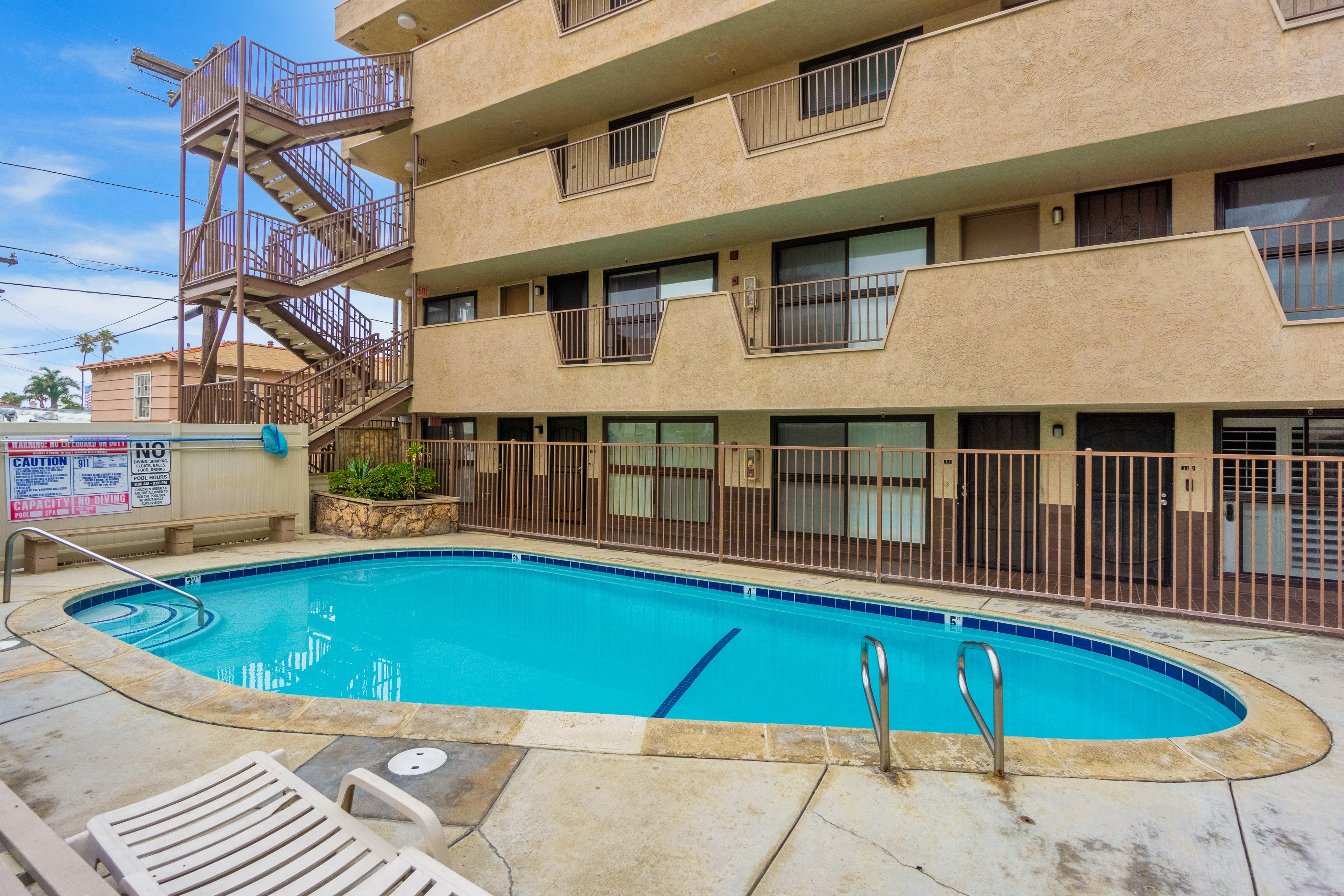 Seashell Serenity Dog-friendly, beachfront condo with an outdoor pool & ocean view