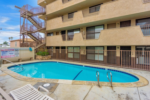 Seashell Serenity Dog-friendly, beachfront condo with an outdoor pool & ocean view