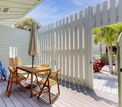 Enchanting condo with full kitchen enclosed yard and washer dryer