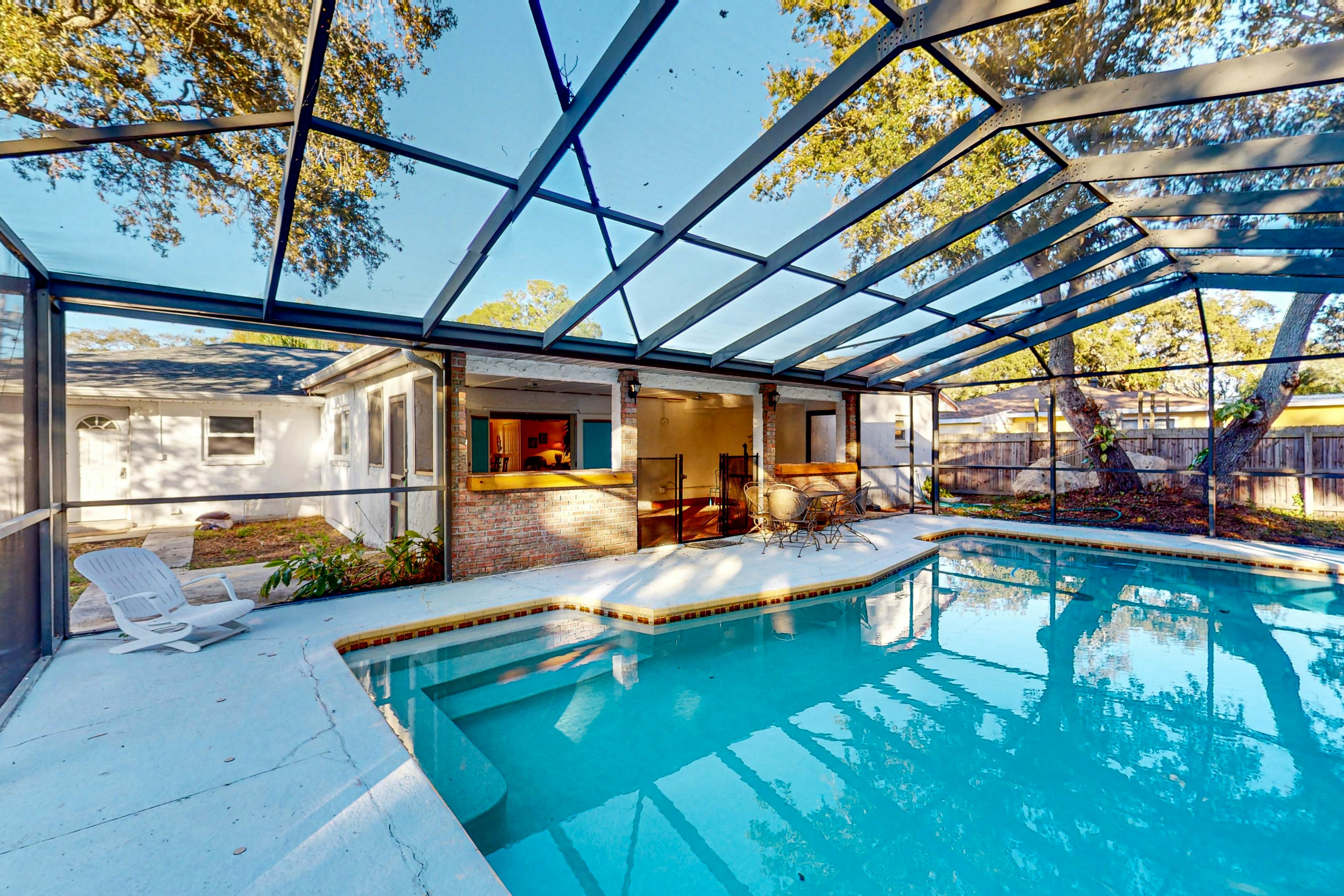 Home near the beach with private pool, enclosed patio, & W/D