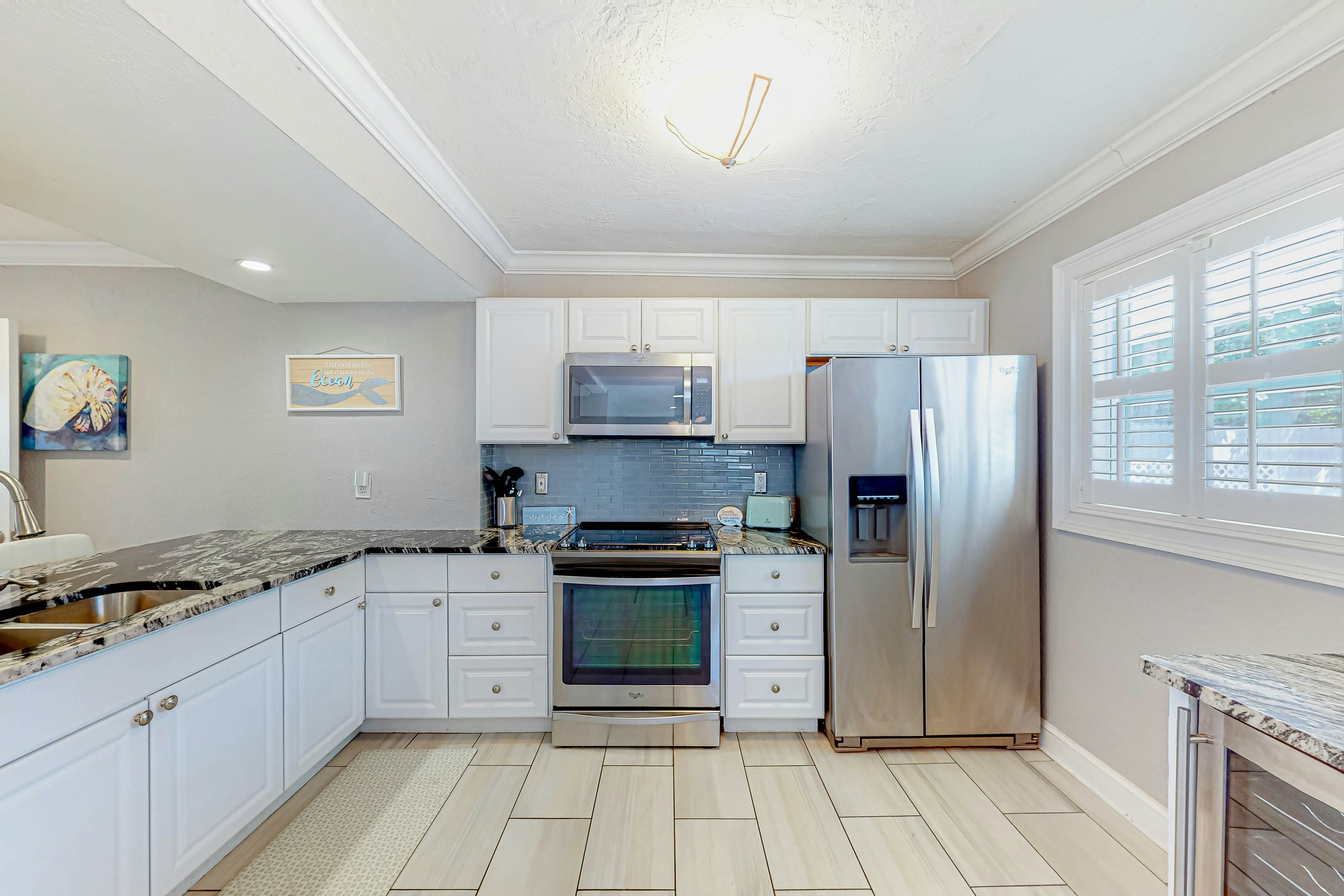 Dog-friendly home near beaches with private pool, enclosed backyard, grill, W/D