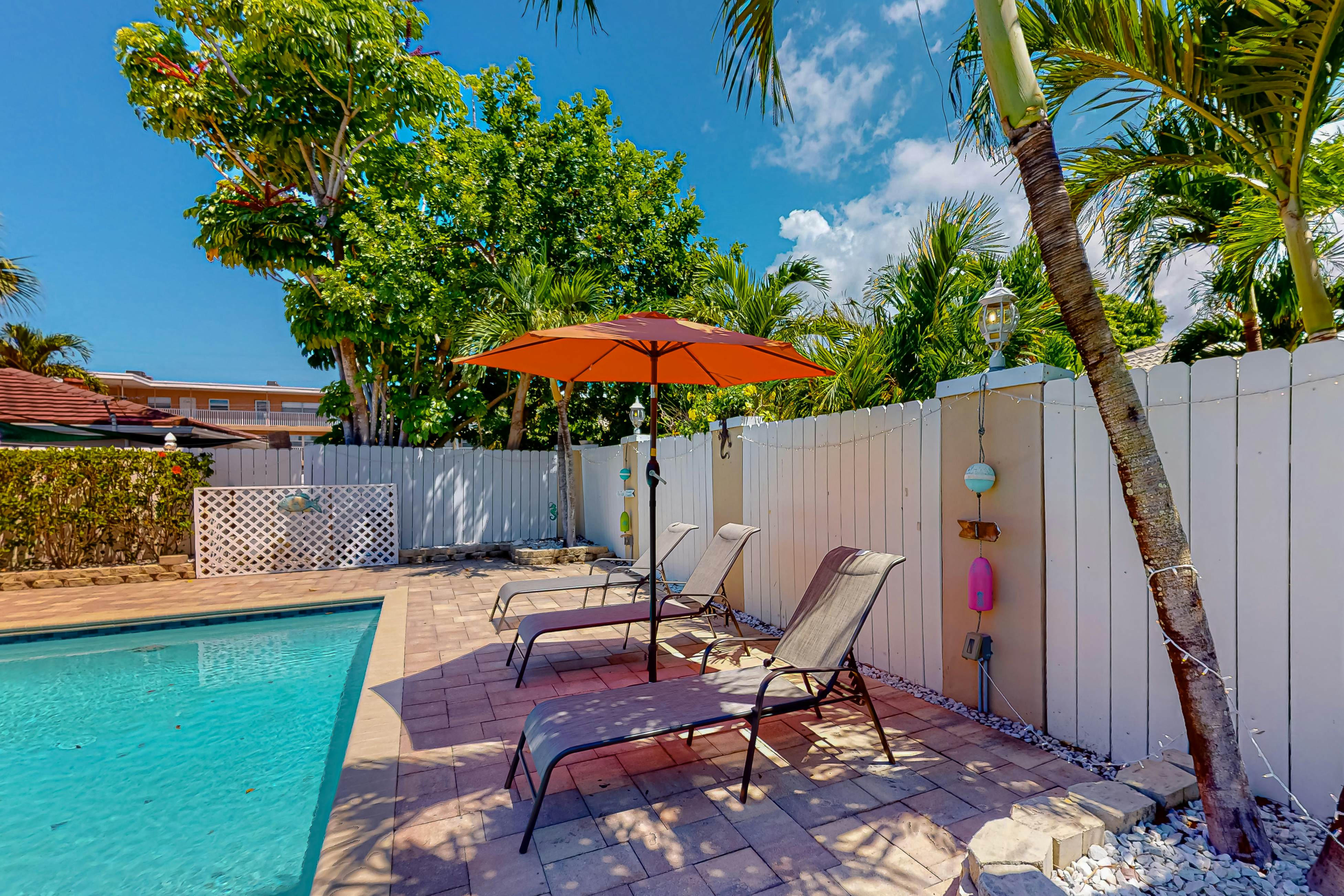 Dog-friendly home near beaches with private pool, enclosed backyard, grill, W/D