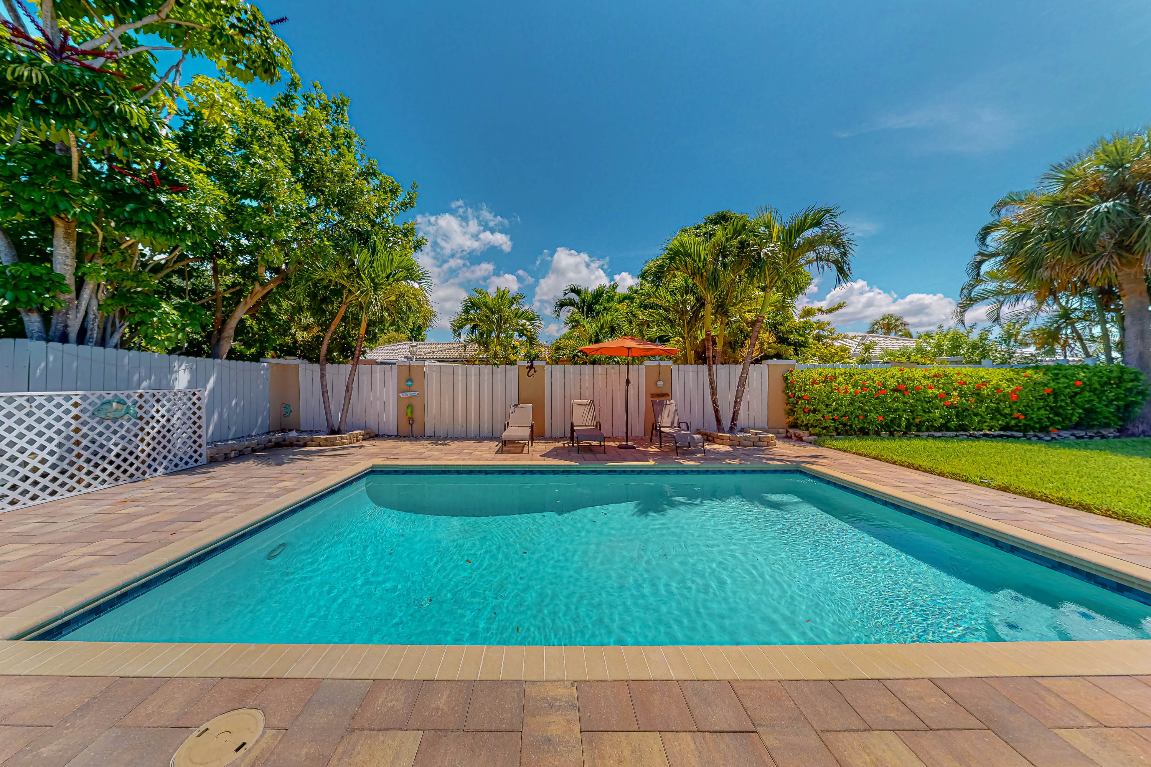 Dog-friendly home near beaches with private pool, enclosed backyard, grill, W/D