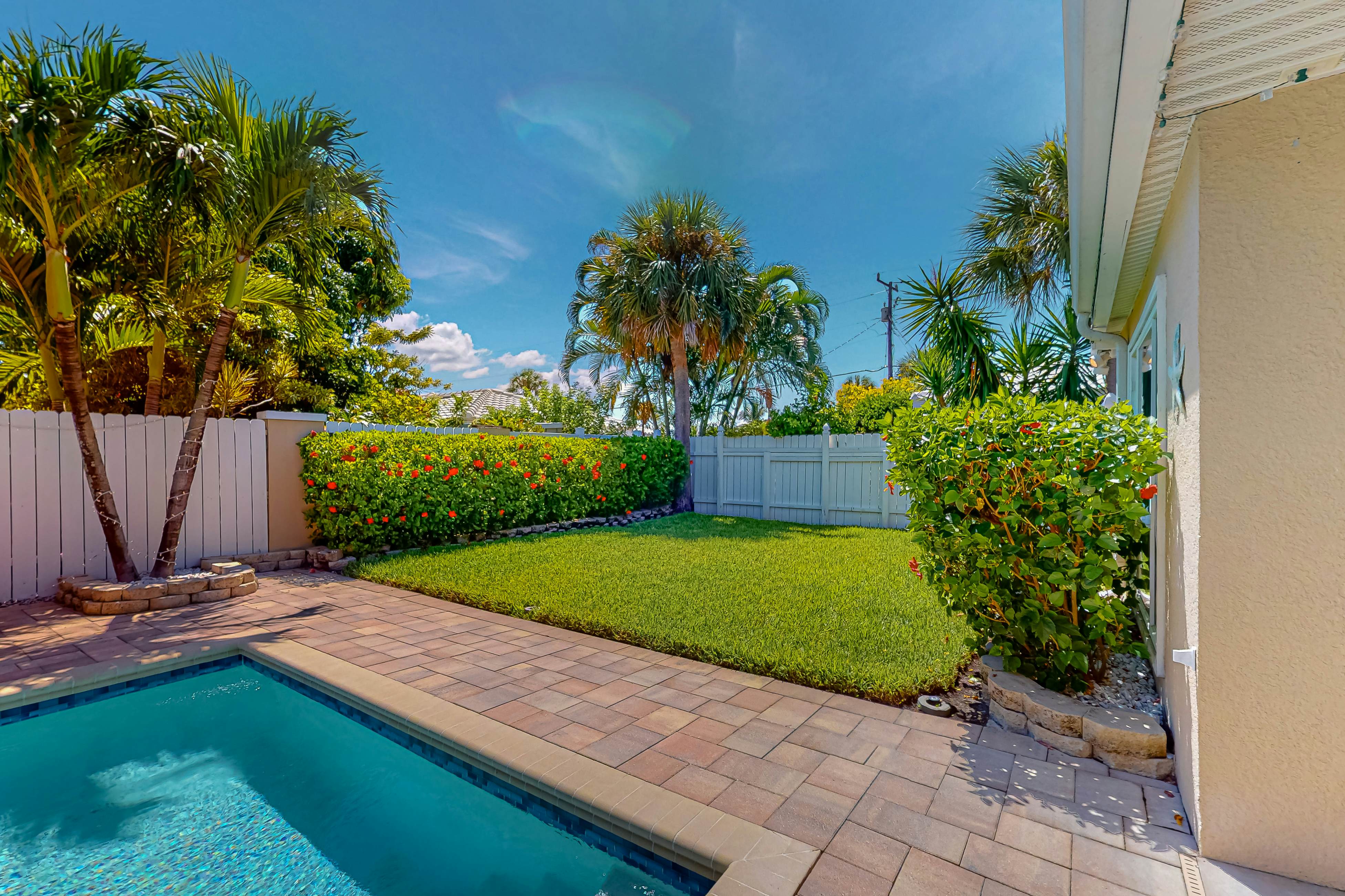 Dog-friendly home near beaches with private pool, enclosed backyard, grill, W/D