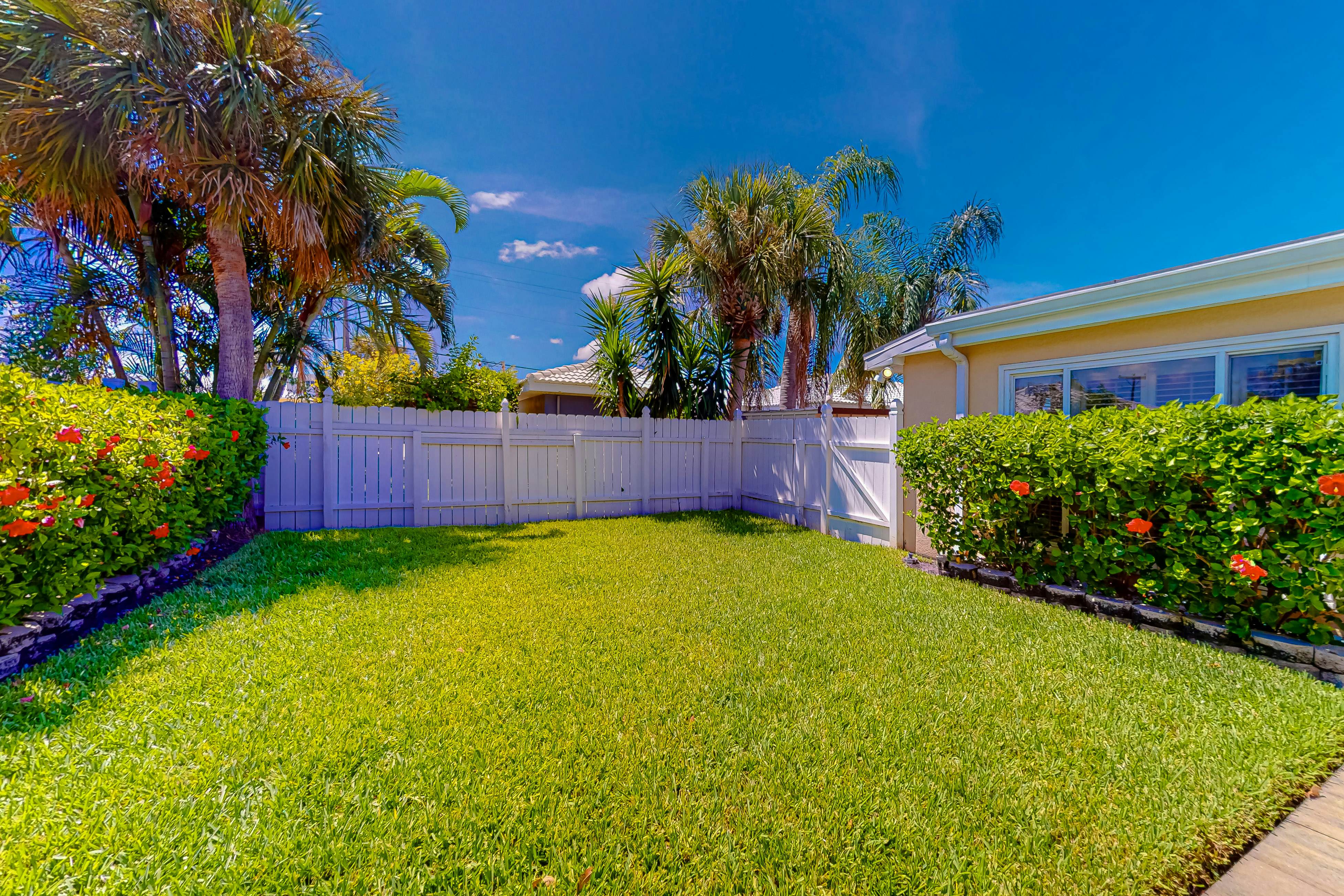 Dog-friendly home near beaches with private pool, enclosed backyard, grill, W/D