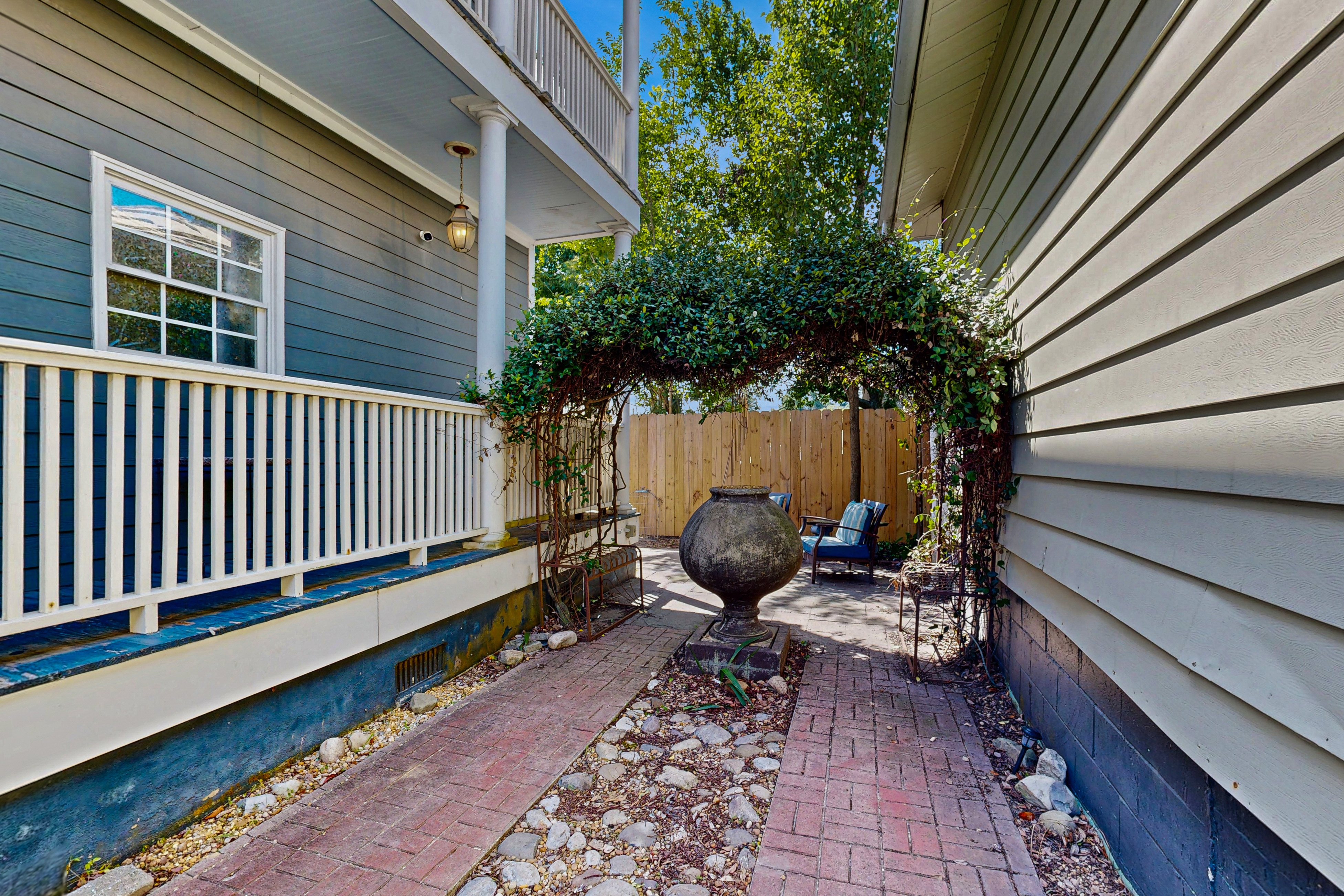 North Central, 30-Day Rental Home w/Double Porches, Garden Patio, and Free WiFi