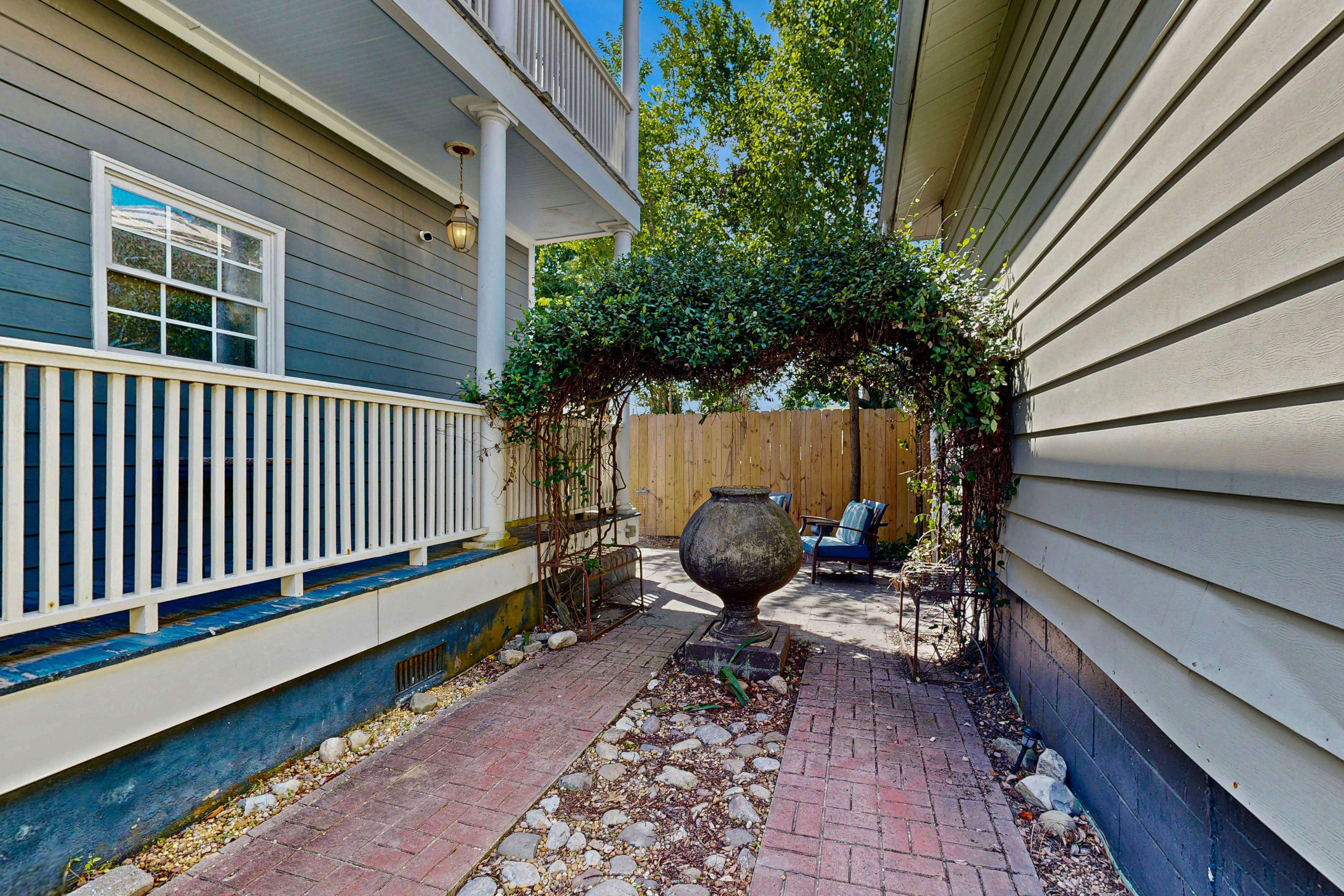 North Central, 30-Day Rental Home w/Double Porches, Garden Patio, and Free WiFi