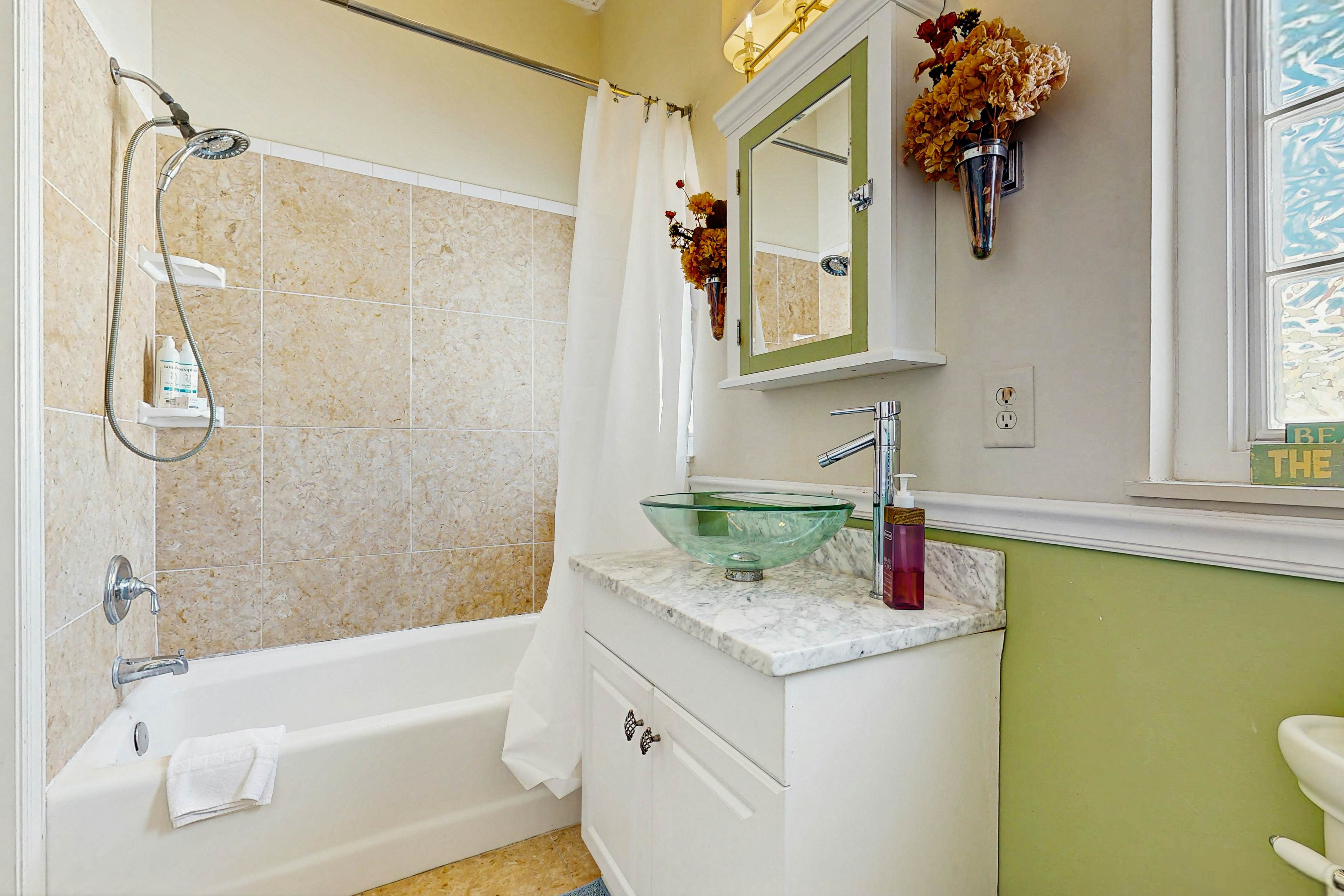 North Central, 30-Day Rental Home w/Double Porches, Garden Patio, and Free WiFi