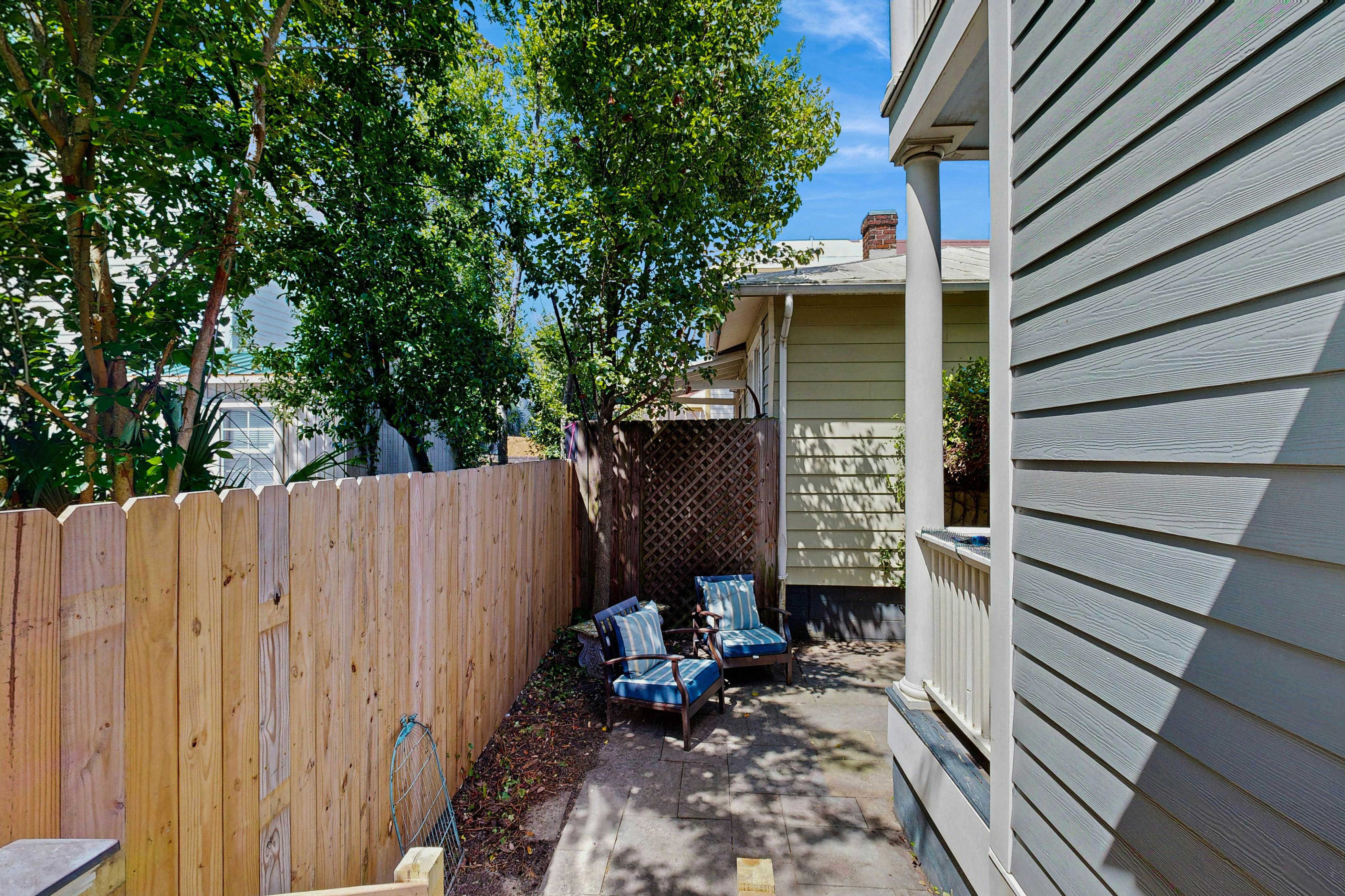 North Central, 30-Day Rental Home w/Double Porches, Garden Patio, and Free WiFi