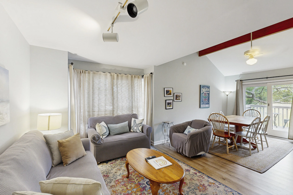 Dog-friendly, riverfront condo w/ shared pool plus access to tennis & gym