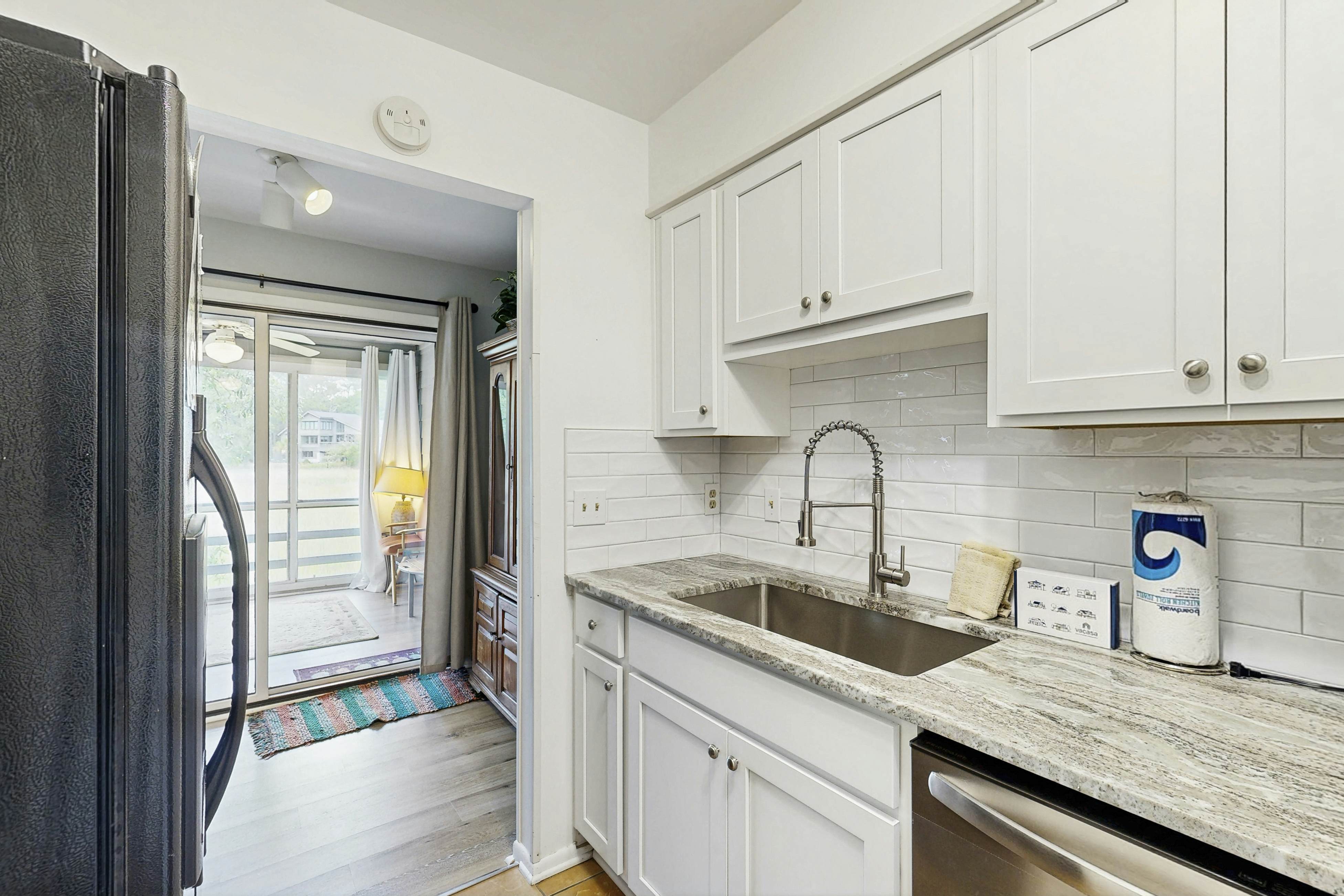 Dog-friendly, riverfront condo w/ shared pool plus access to tennis & gym