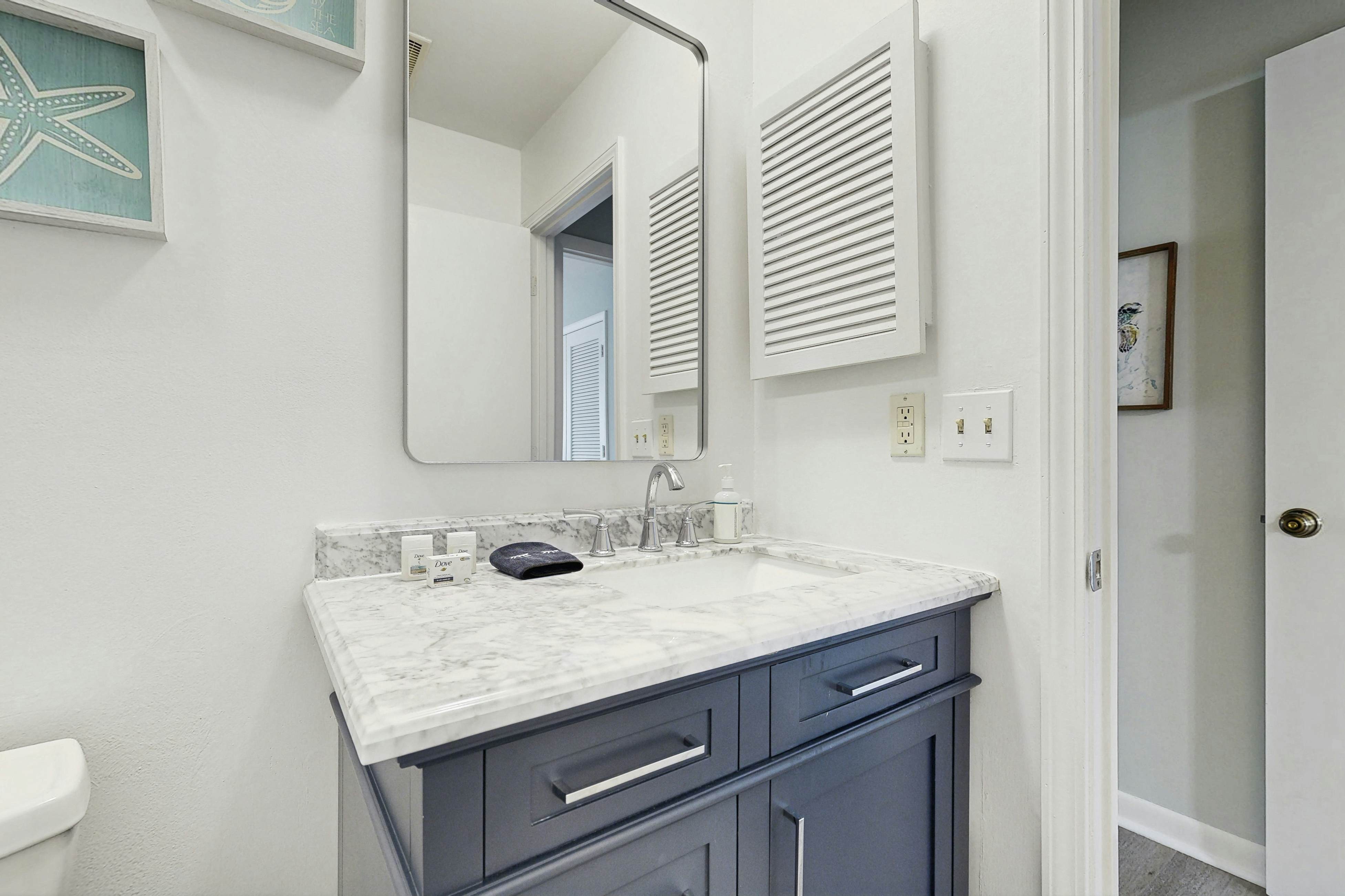 Dog-friendly, riverfront condo w/ shared pool plus access to tennis & gym