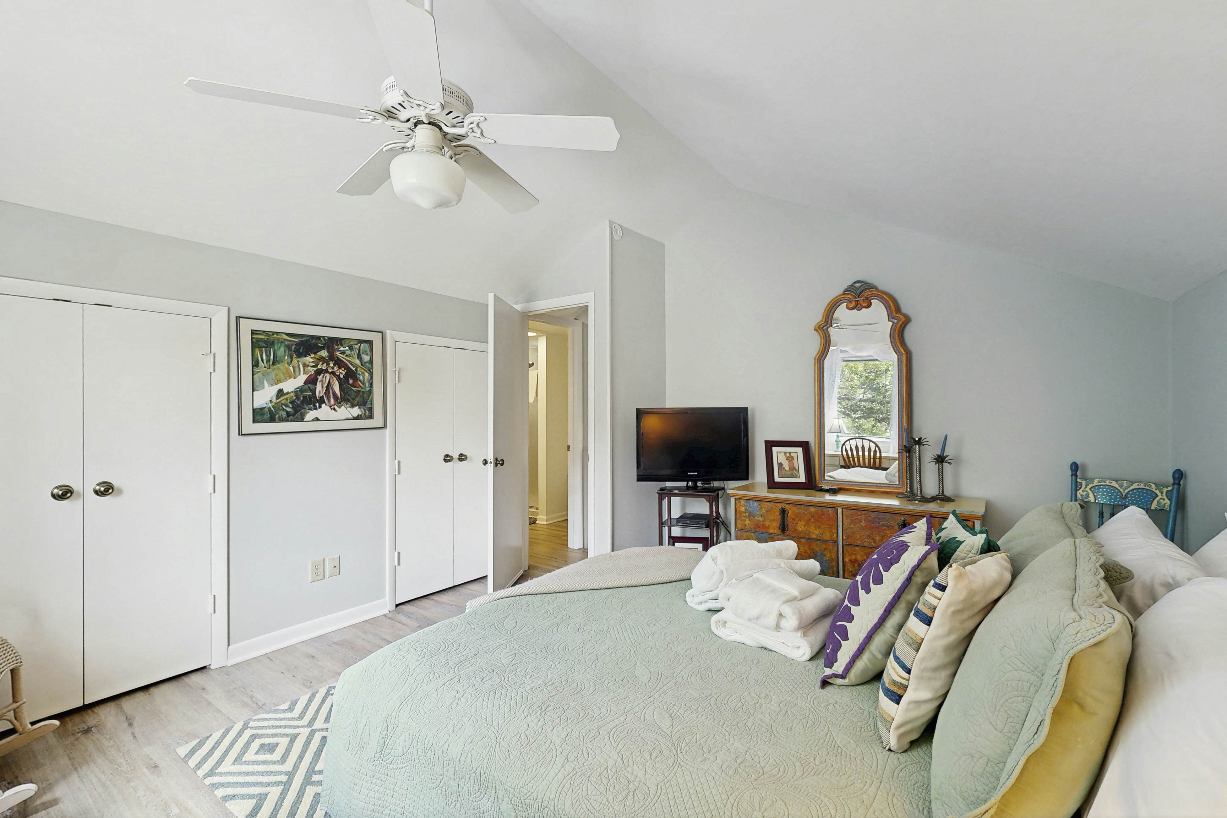 Dog-friendly, riverfront condo w/ shared pool plus access to tennis & gym