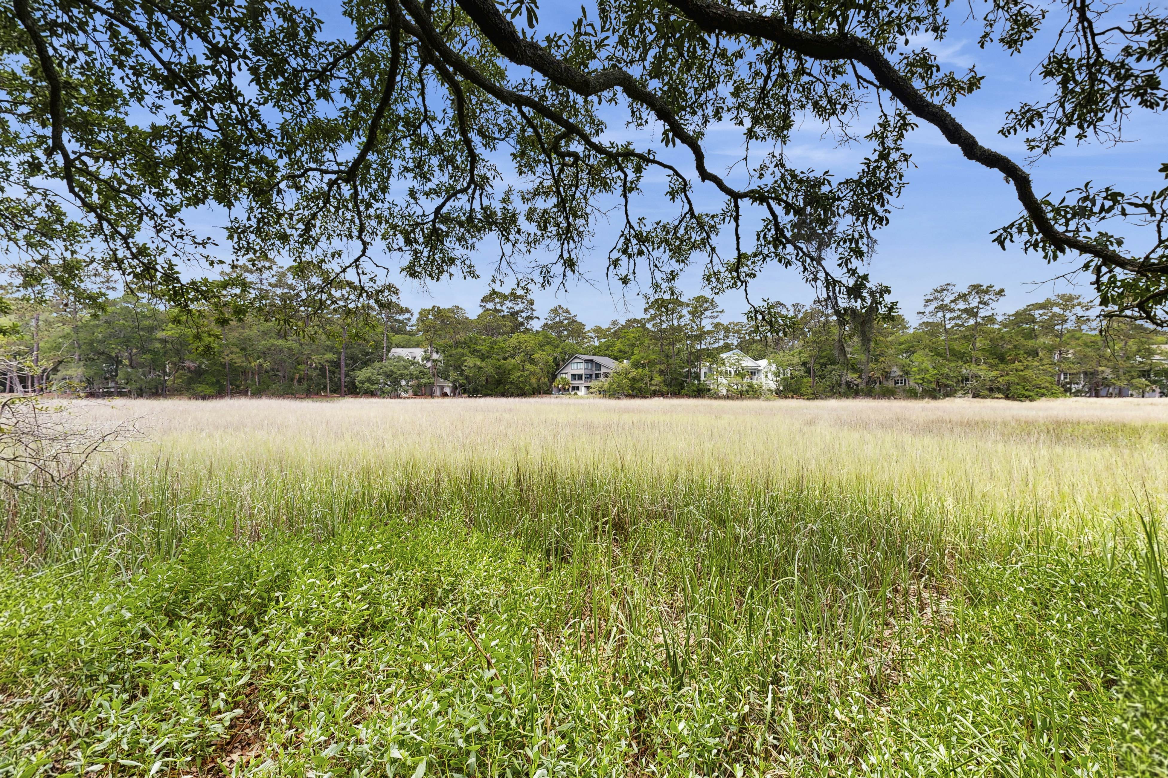 Dog-friendly, riverfront condo w/ shared pool plus access to tennis & gym