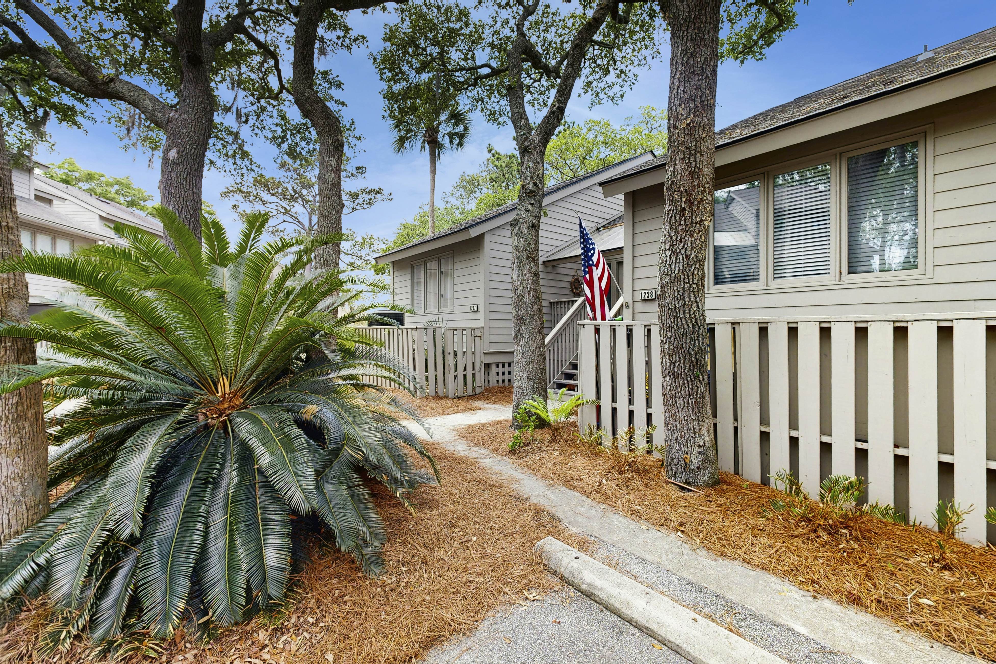 Dog-friendly, riverfront condo w/ shared pool plus access to tennis & gym