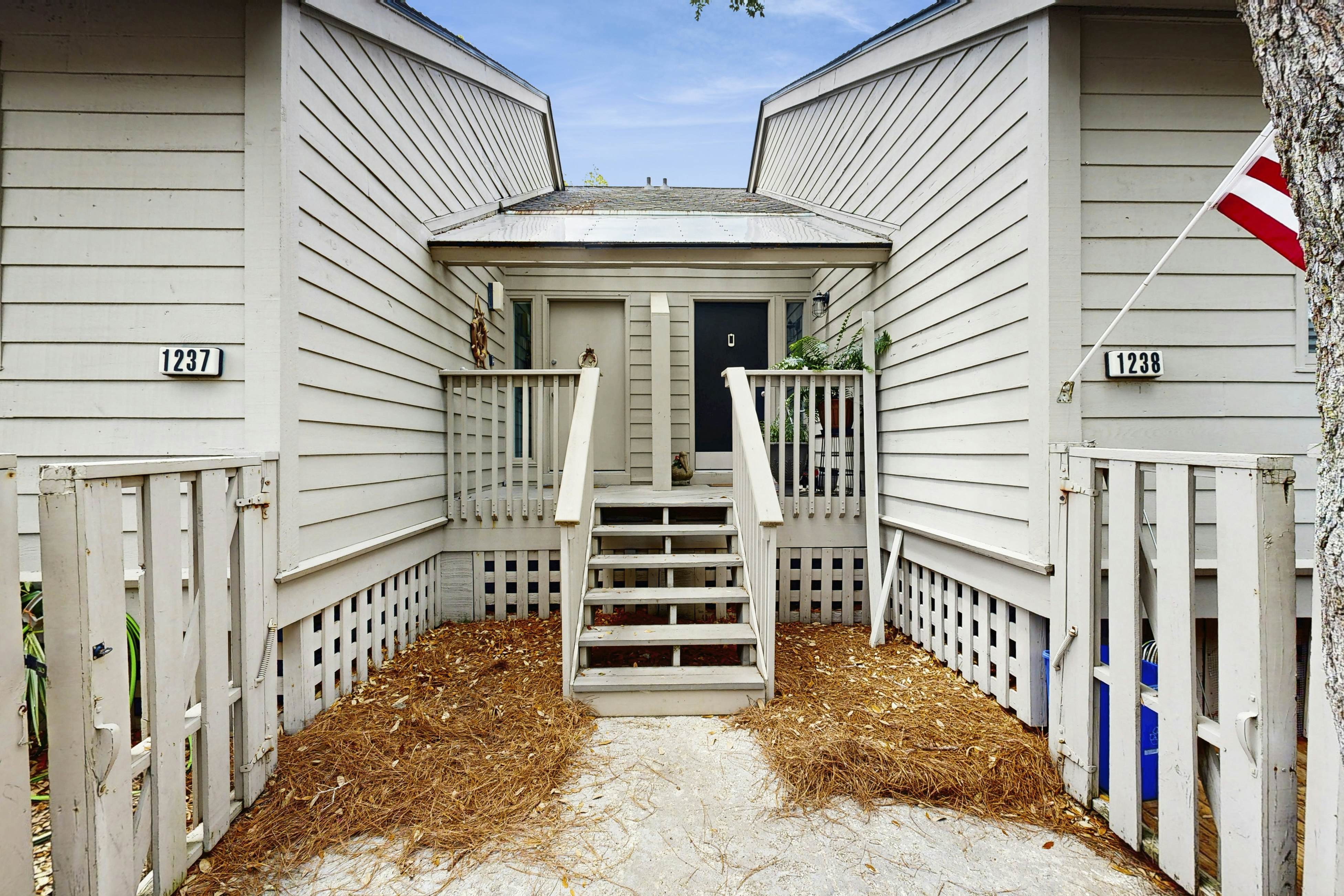 Dog-friendly, riverfront condo w/ shared pool plus access to tennis & gym