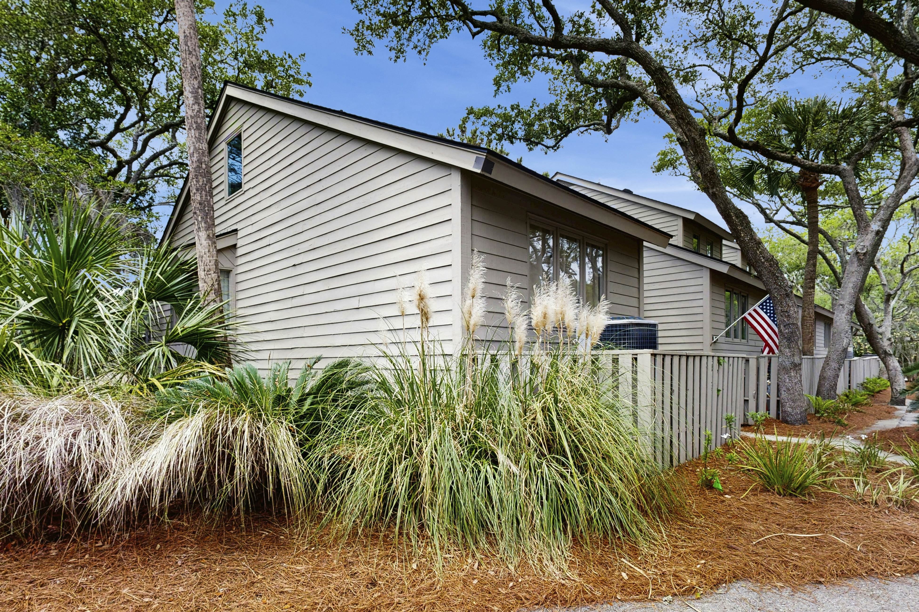 Dog-friendly, riverfront condo w/ shared pool plus access to tennis & gym