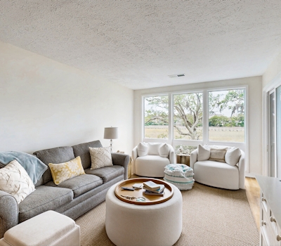 Charming Coastal Condo, with Shared Pool, Fitness Center & Dock