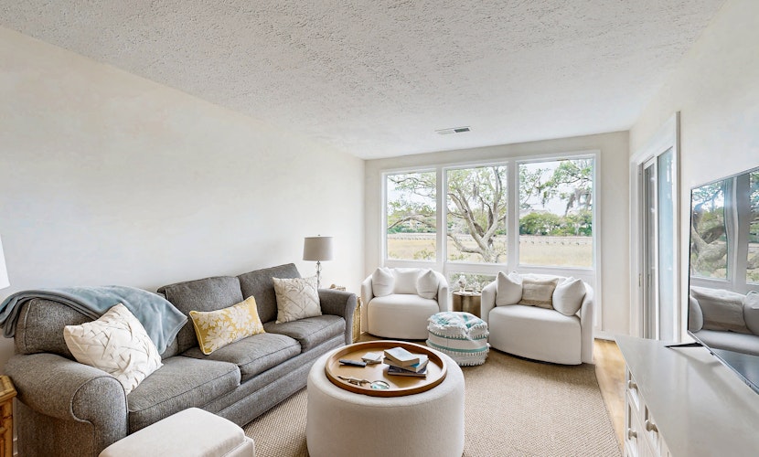 Charming Coastal Condo, with Shared Pool, Fitness Center & Dock