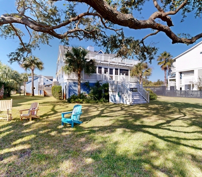 Charming 2,704 Square Foot Beach Home with Balconies & Lush Yard