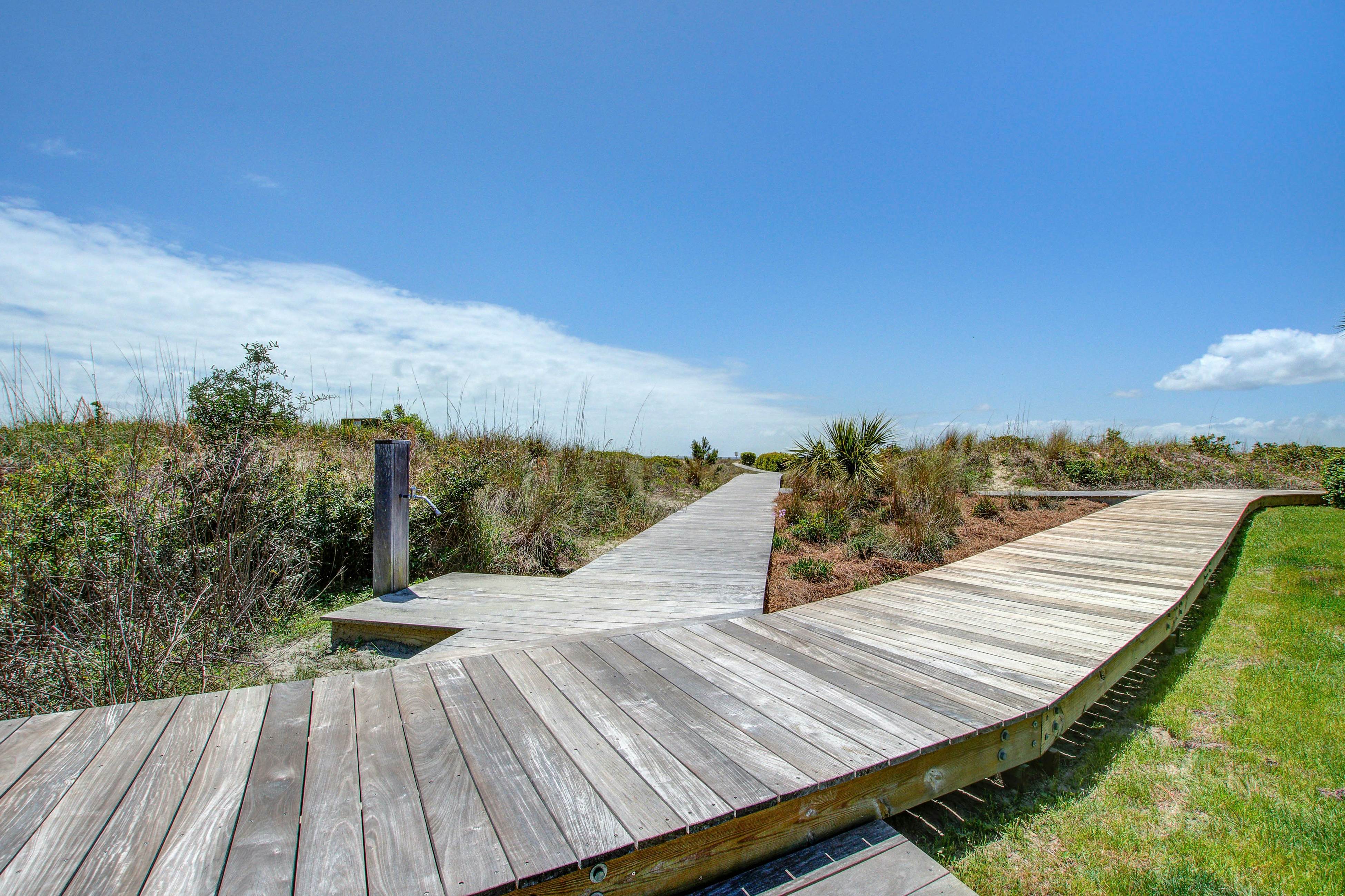 Beachfront villa with dolphin viewing deck, shared pools, tennis, golf & more