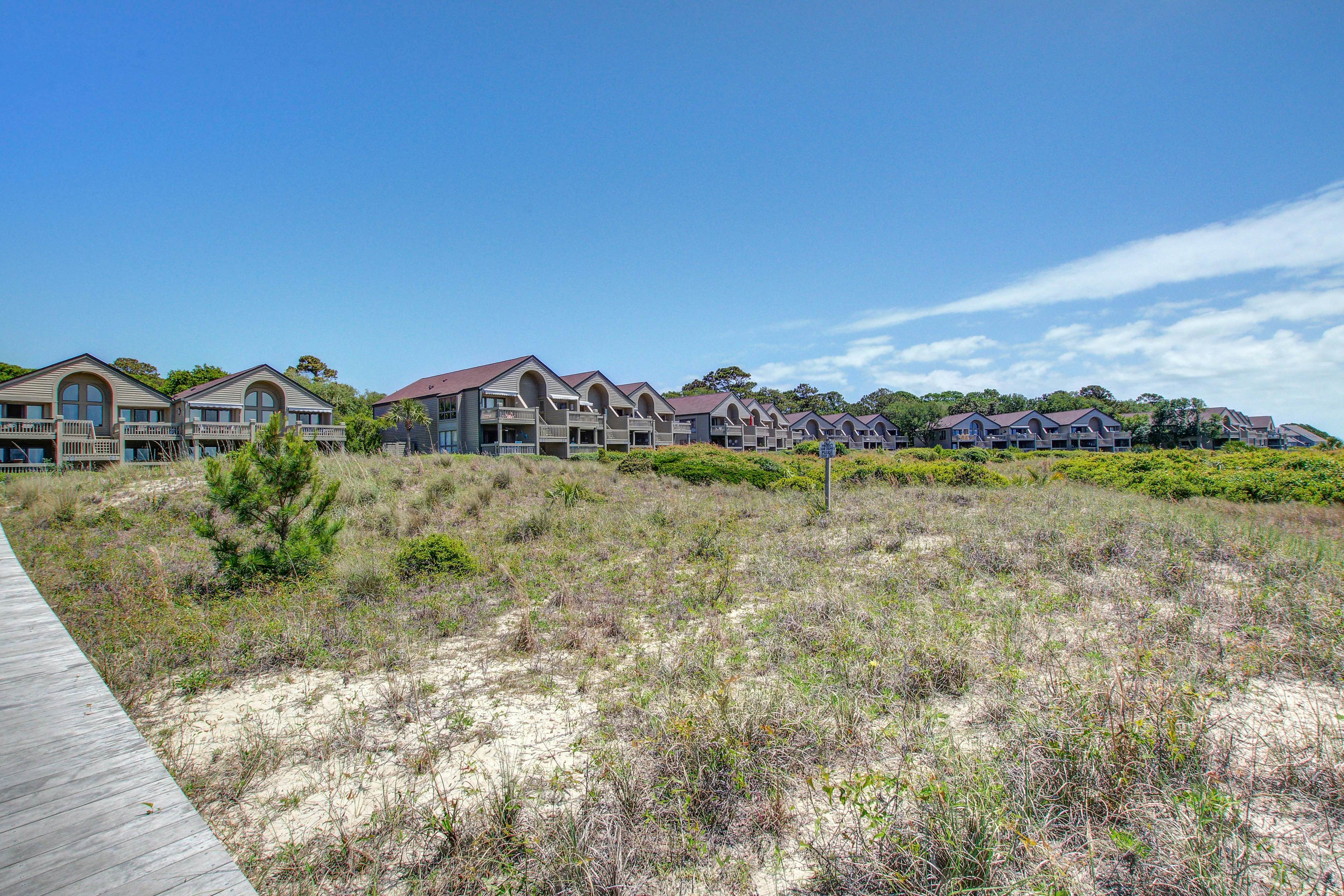 Beachfront villa with dolphin viewing deck, shared pools, tennis, golf & more