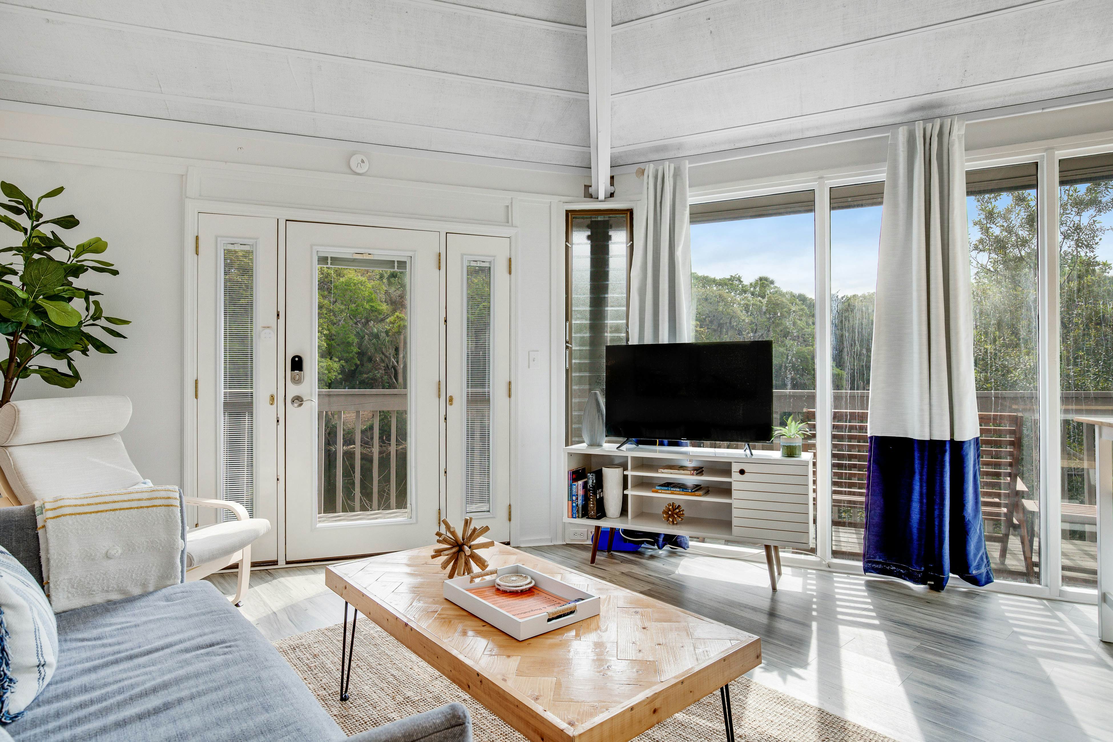 Lakefront home with lagoon view, deck & AC - close to beach, golf, & pools