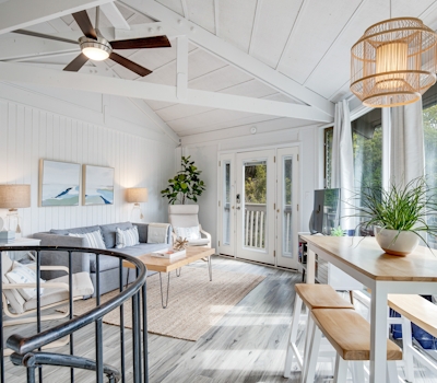 Lakefront home with lagoon view, deck & AC - close to beach, golf, & pools