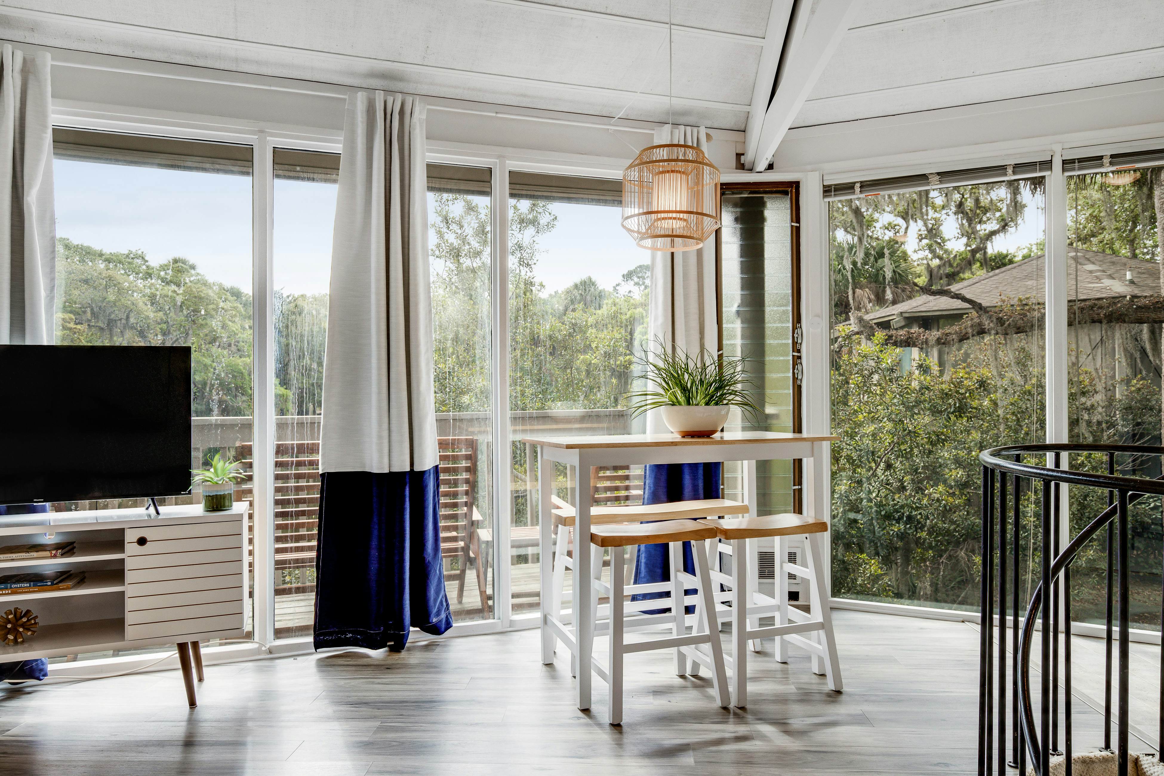 Lakefront home with lagoon view, deck & AC - close to beach, golf, & pools