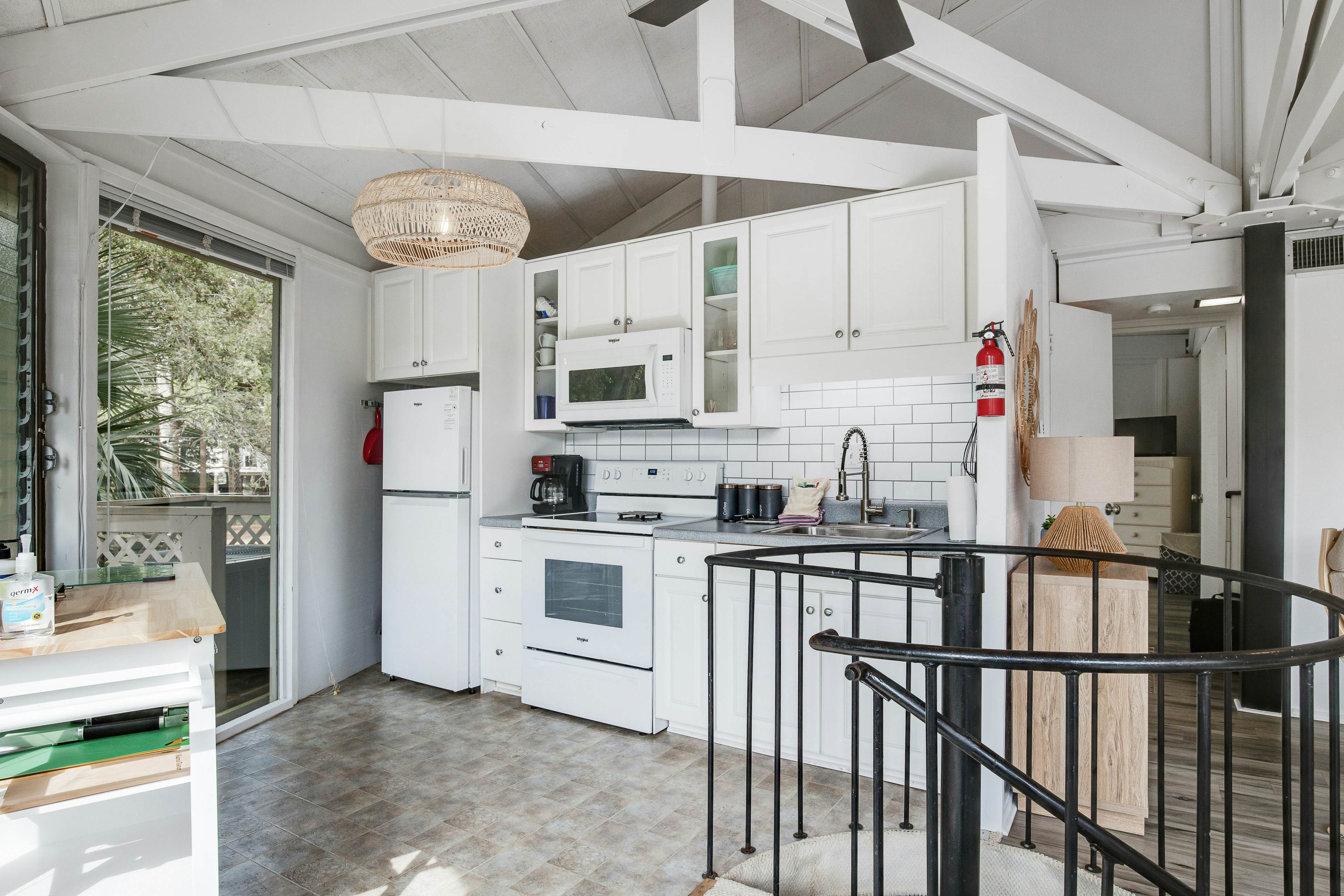 Lakefront home with lagoon view, deck & AC - close to beach, golf, & pools