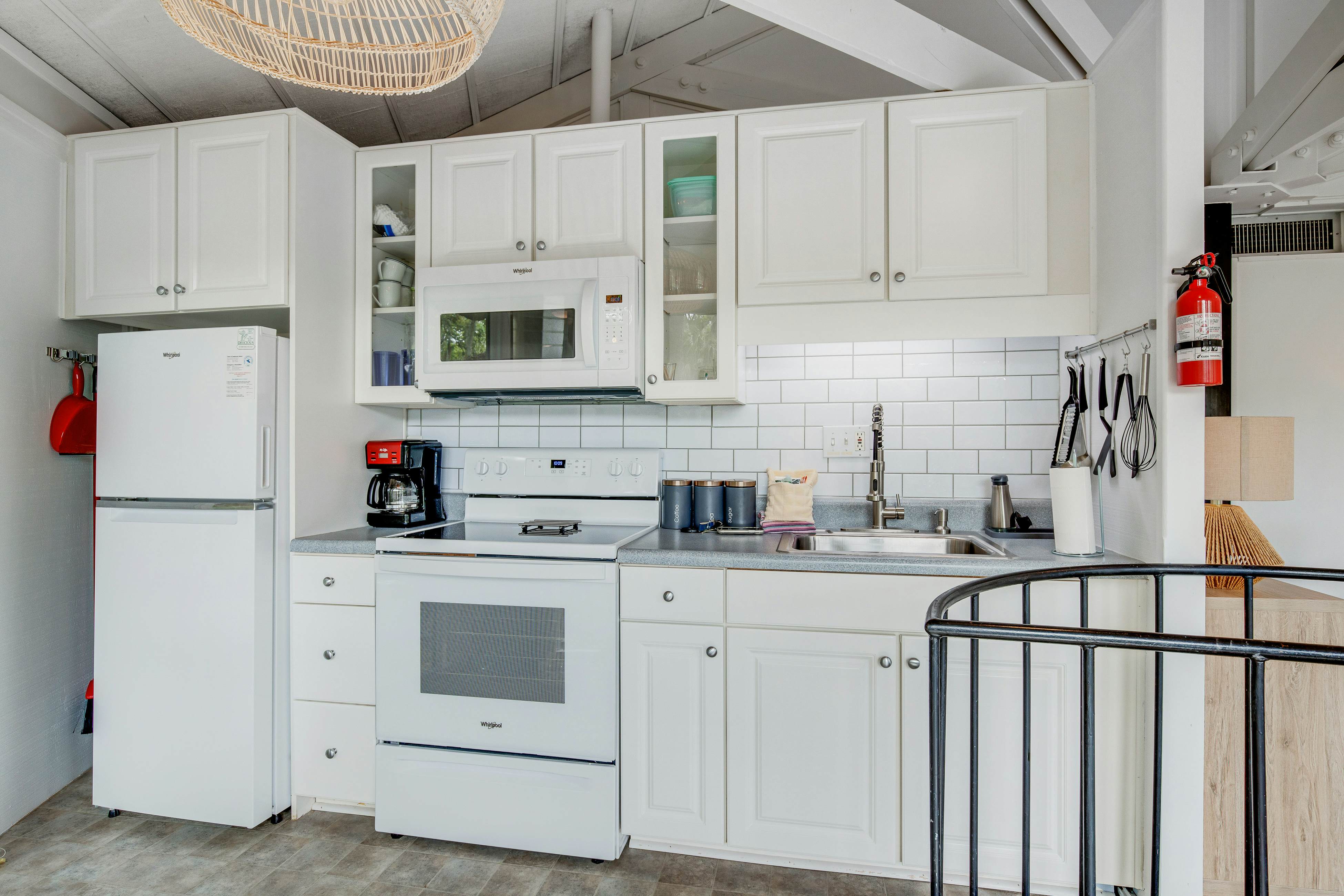 Lakefront home with lagoon view, deck & AC - close to beach, golf, & pools