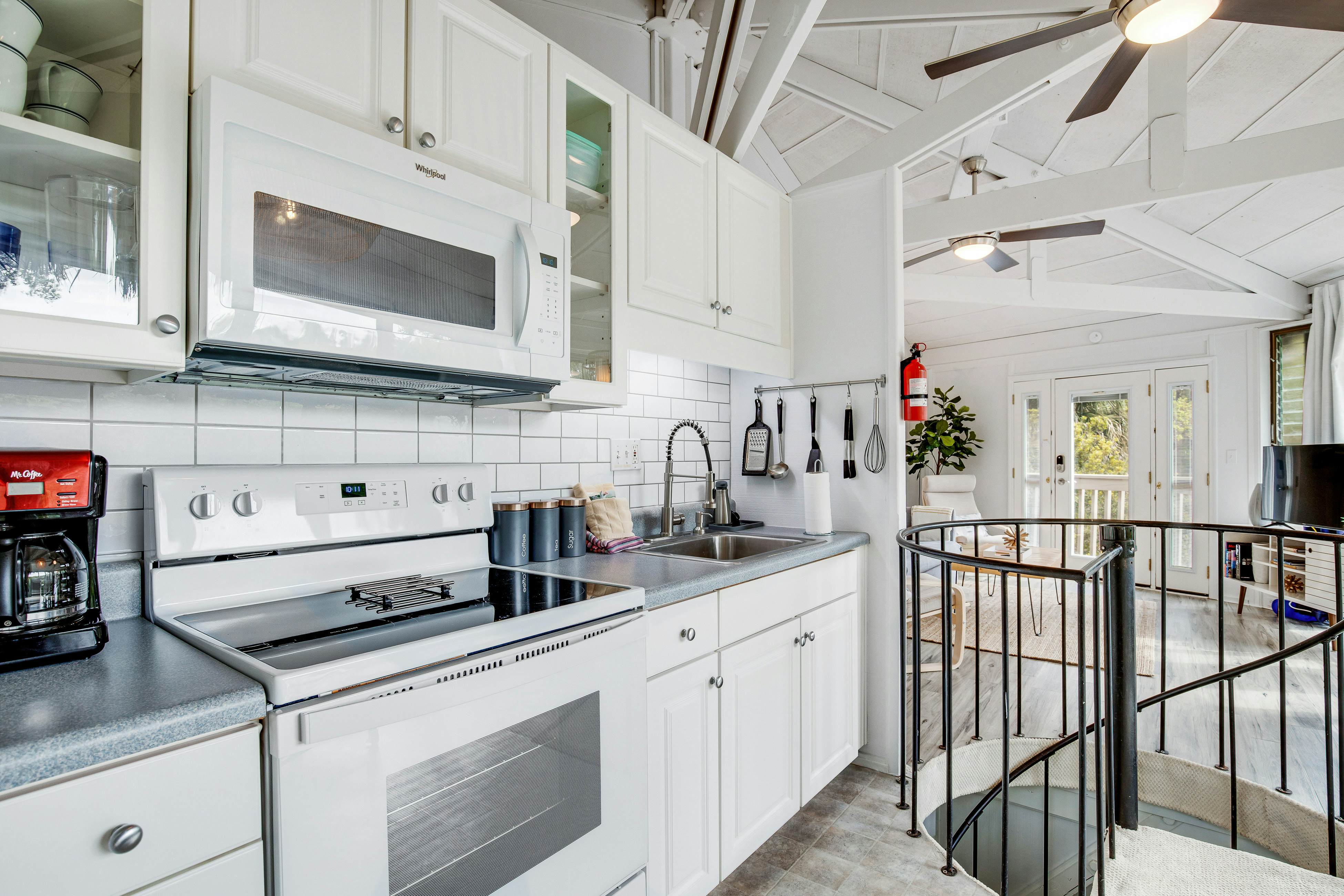 Lakefront home with lagoon view, deck & AC - close to beach, golf, & pools