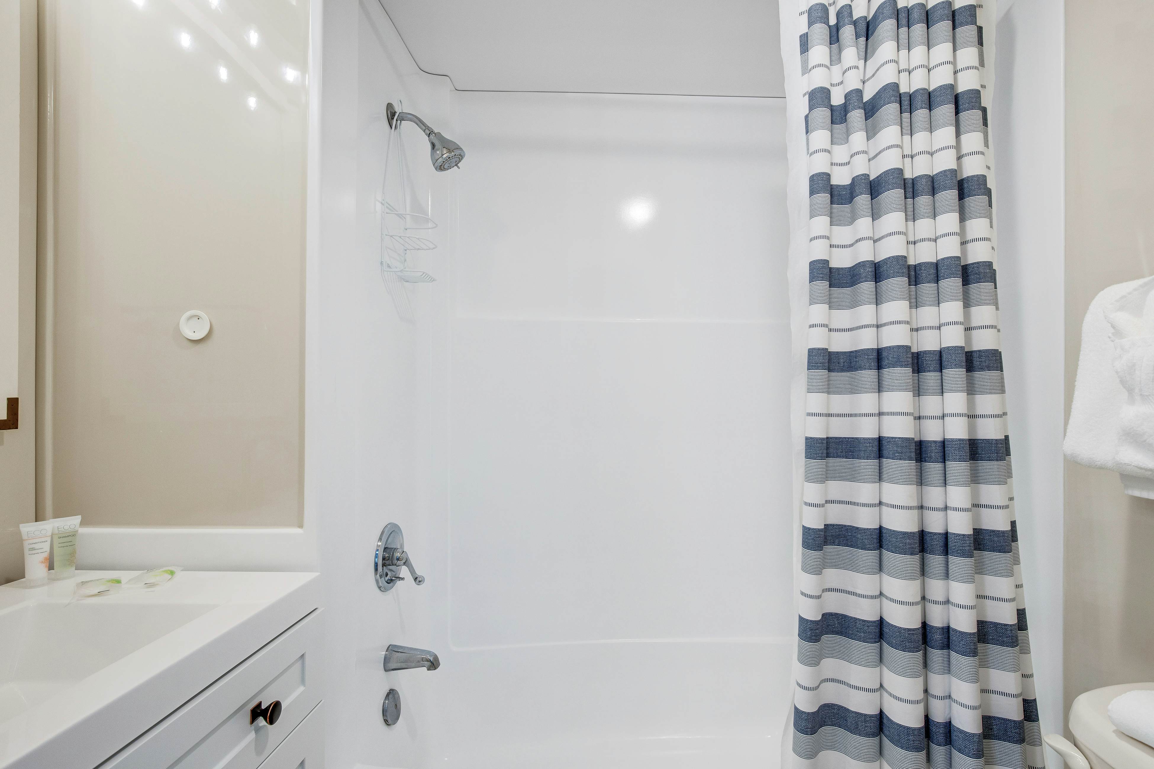 Lakefront home with lagoon view, deck & AC - close to beach, golf, & pools