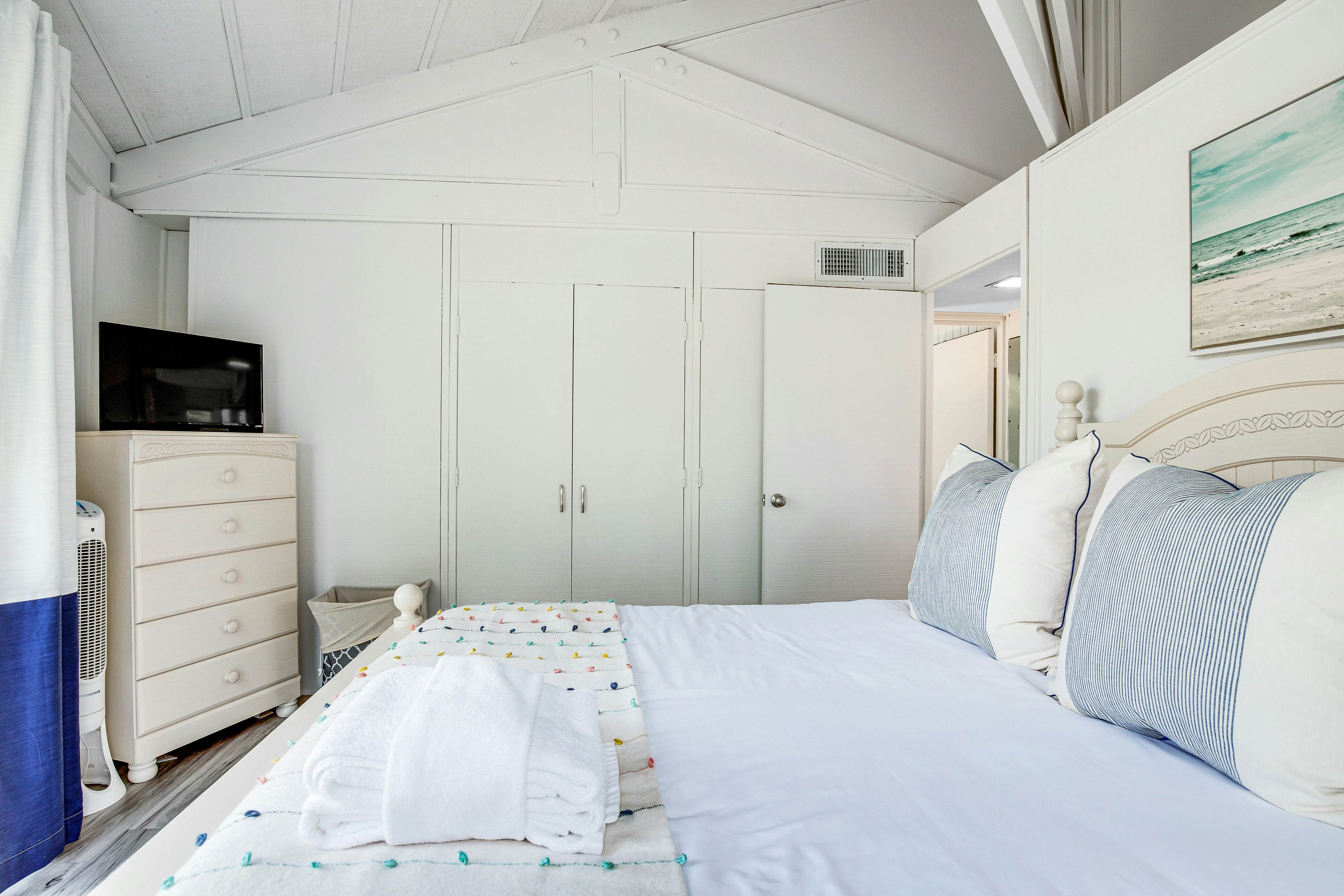 Lakefront home with lagoon view, deck & AC - close to beach, golf, & pools