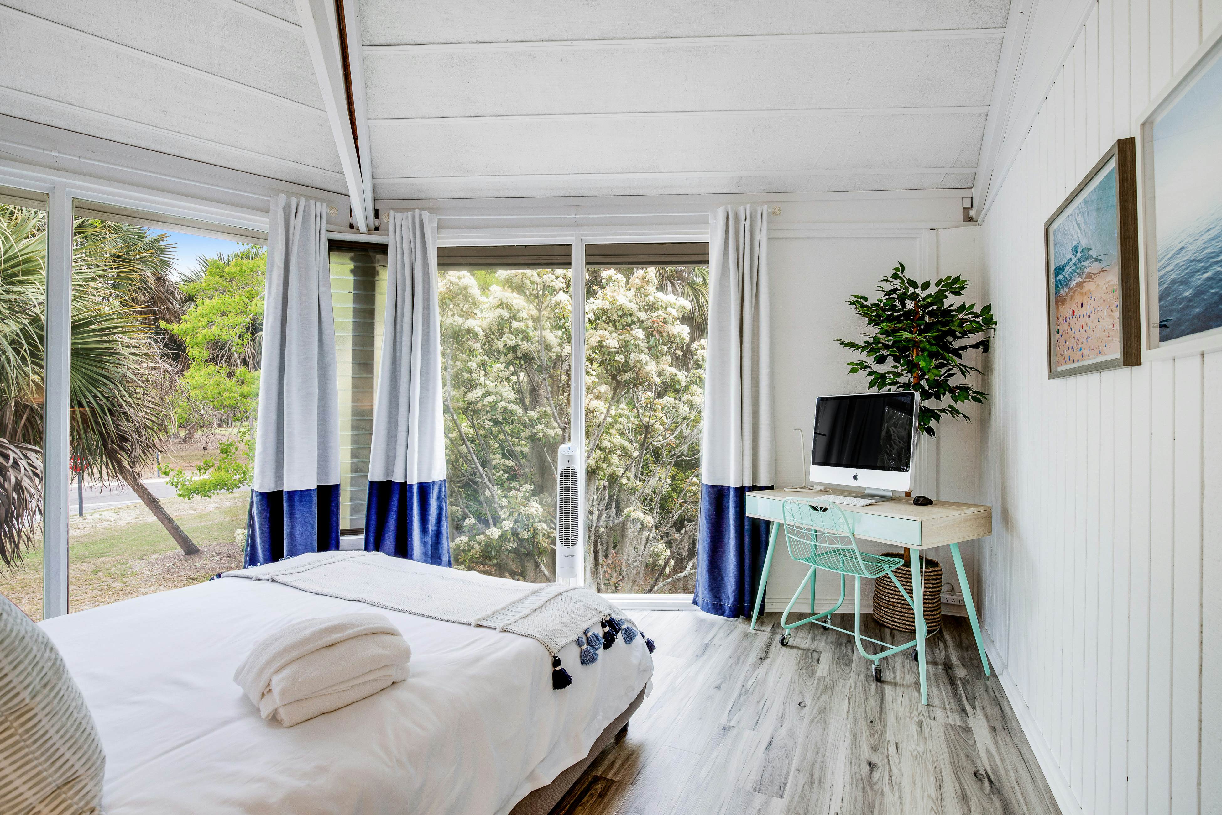 Lakefront home with lagoon view, deck & AC - close to beach, golf, & pools