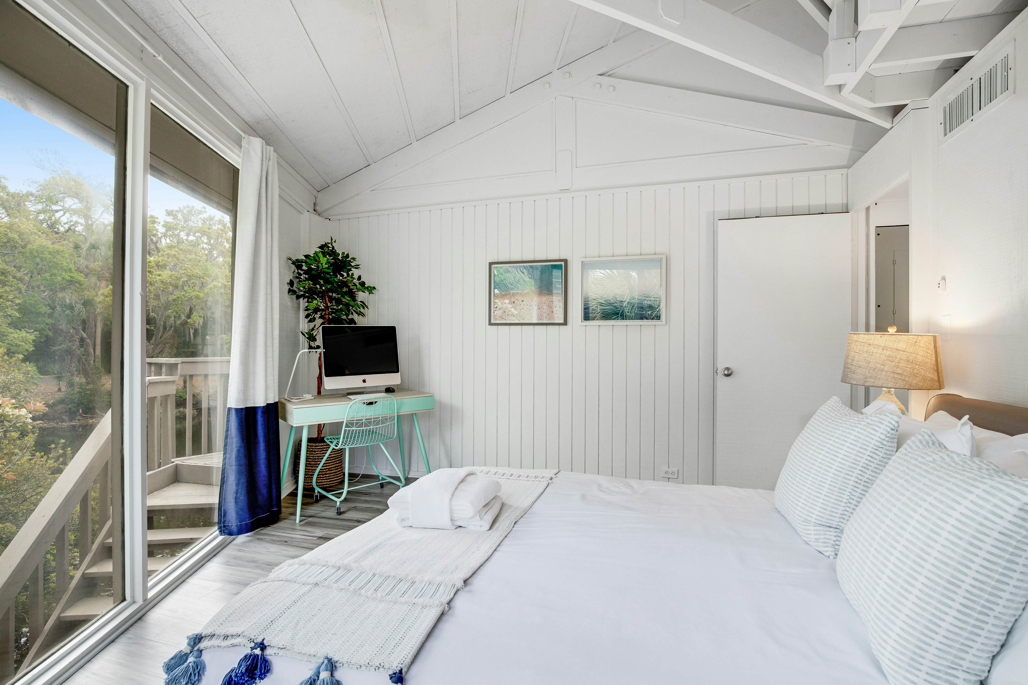 Lakefront home with lagoon view, deck & AC - close to beach, golf, & pools