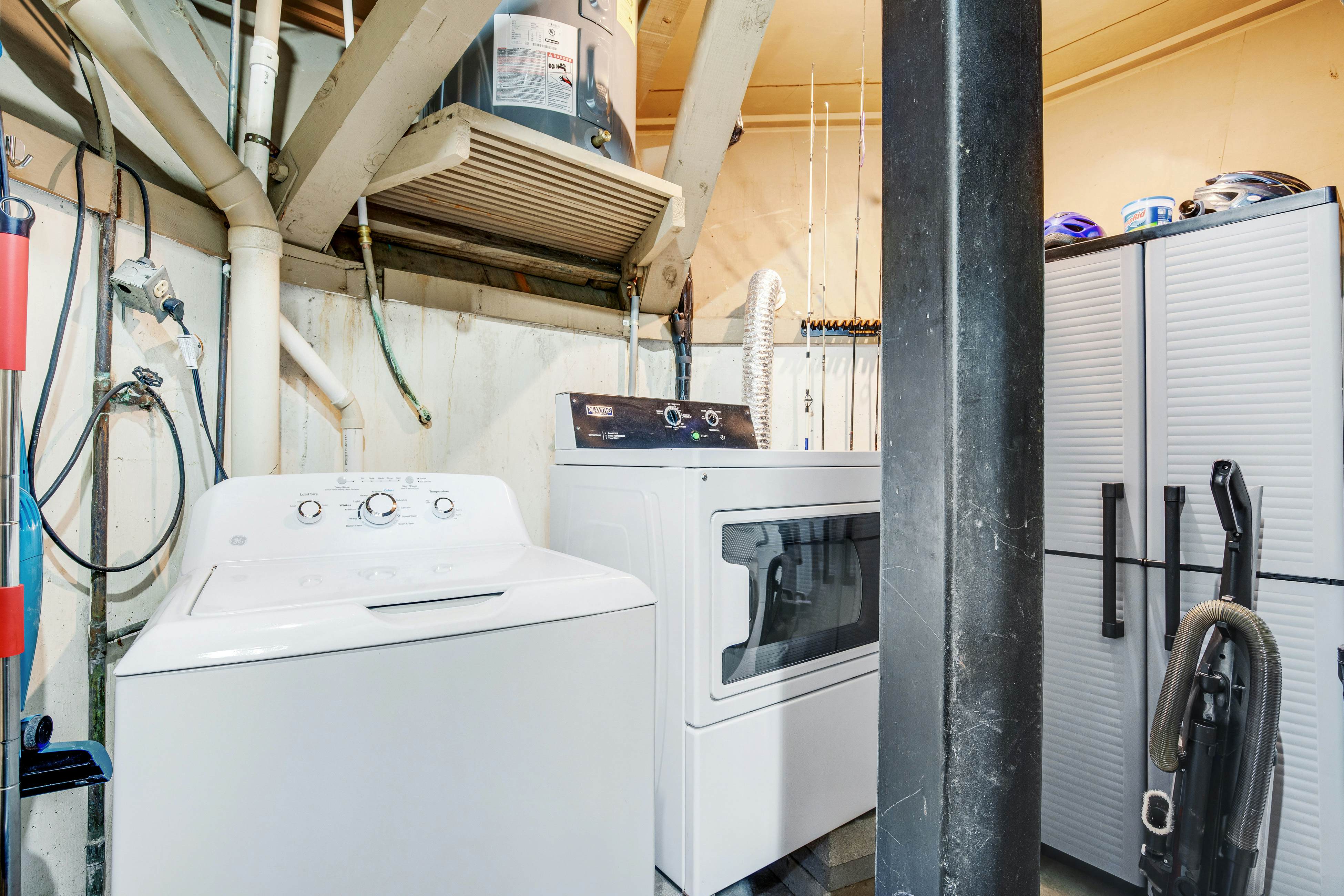 Lakefront home with lagoon view, deck & AC - close to beach, golf, & pools