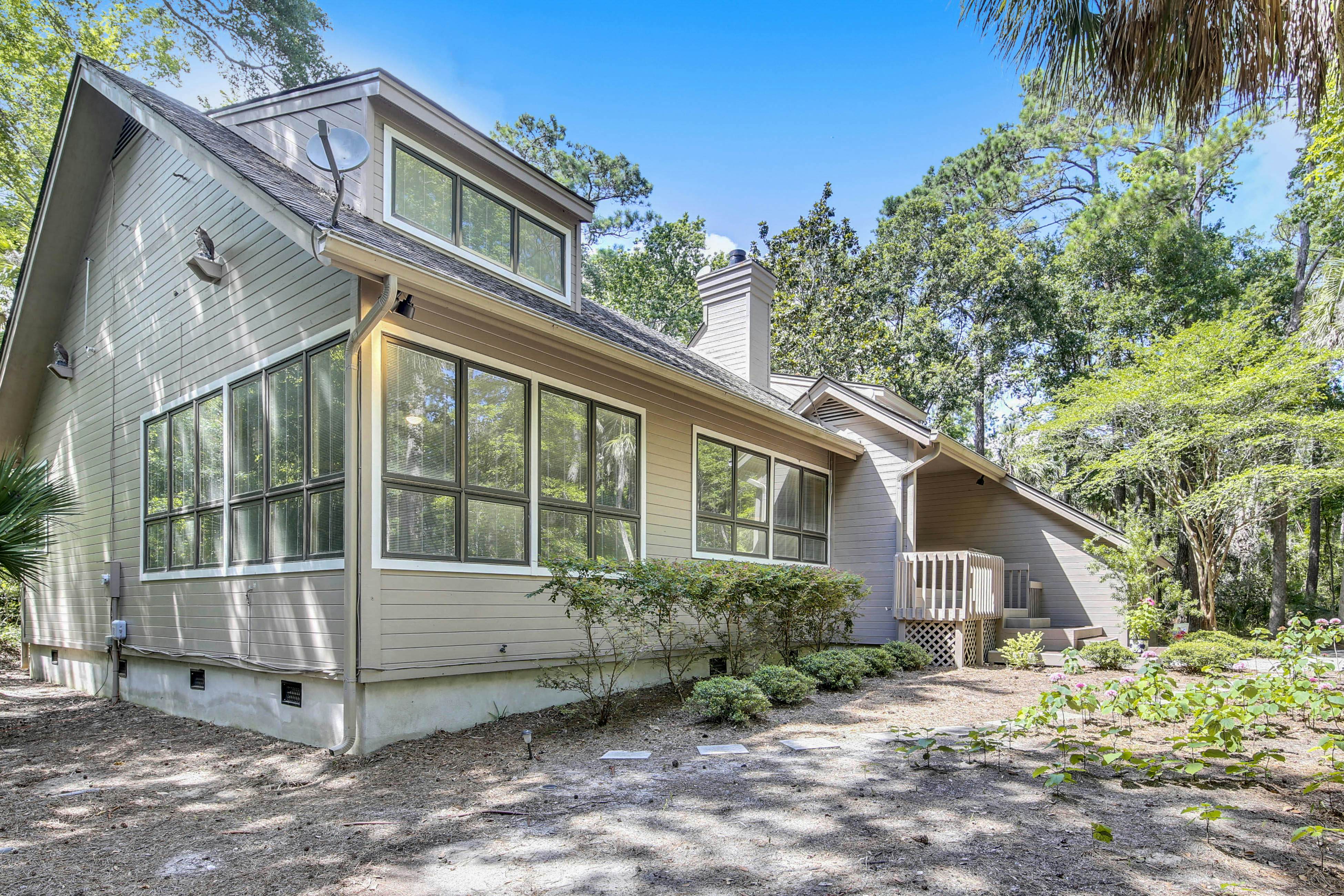 Dog-friendly home with large deck, on-site pools, tennis & Beach Club