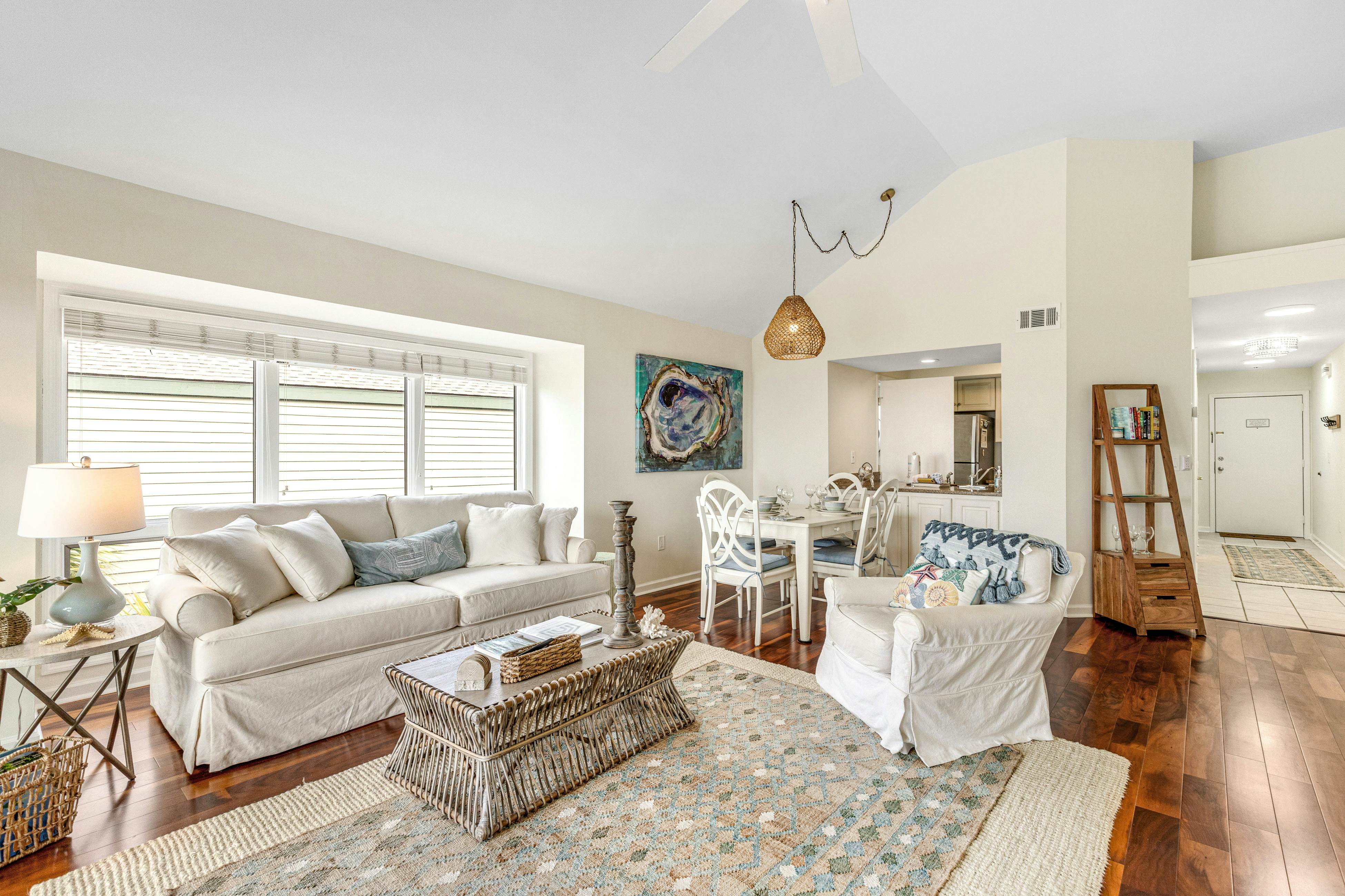 2nd floor villa with water views, lovely balcony & w/d - walk to Beach Club