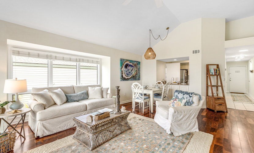 2nd floor villa with water views, lovely balcony & w/d - walk to Beach Club