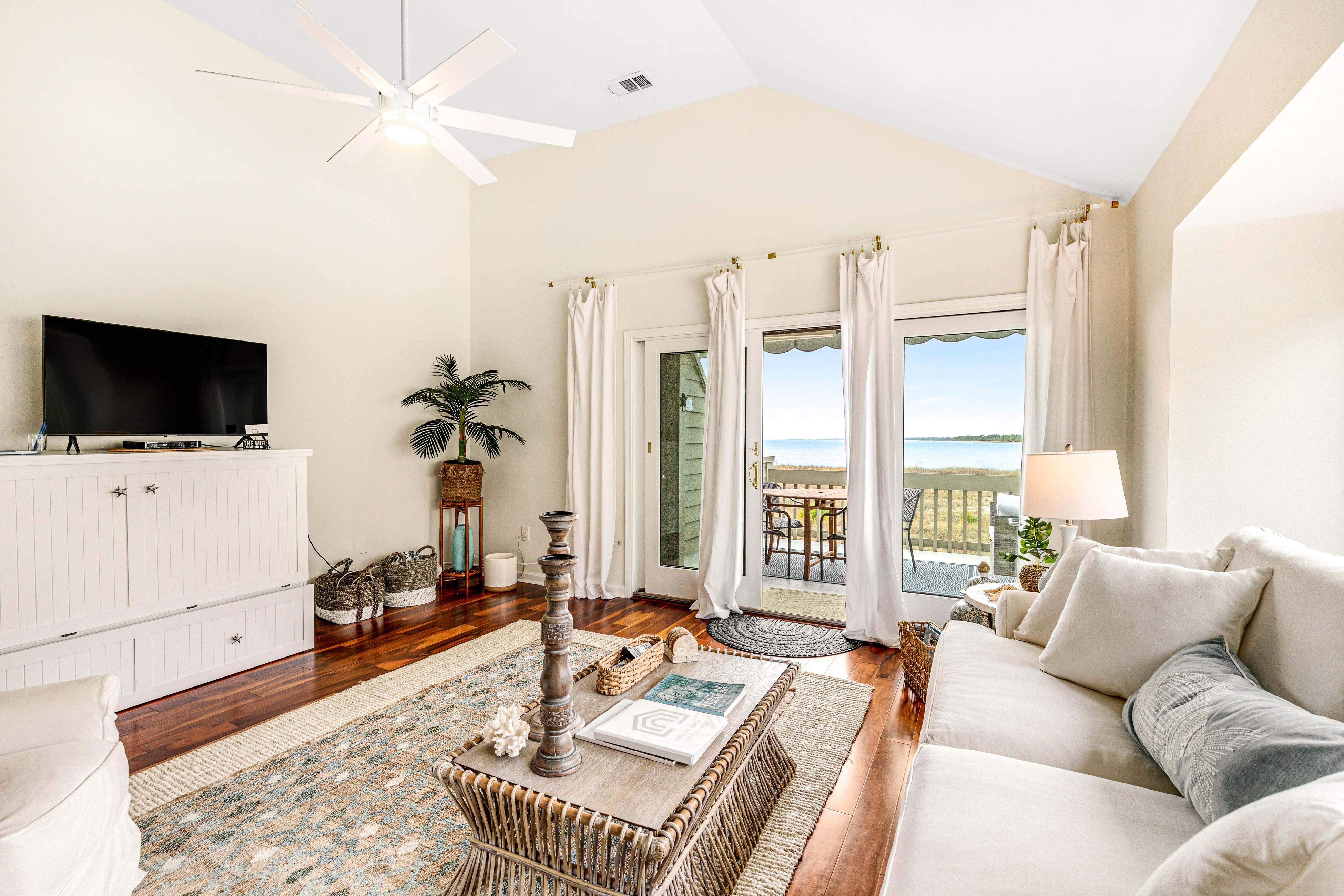 2nd floor villa with water views, lovely balcony & w/d - walk to Beach Club